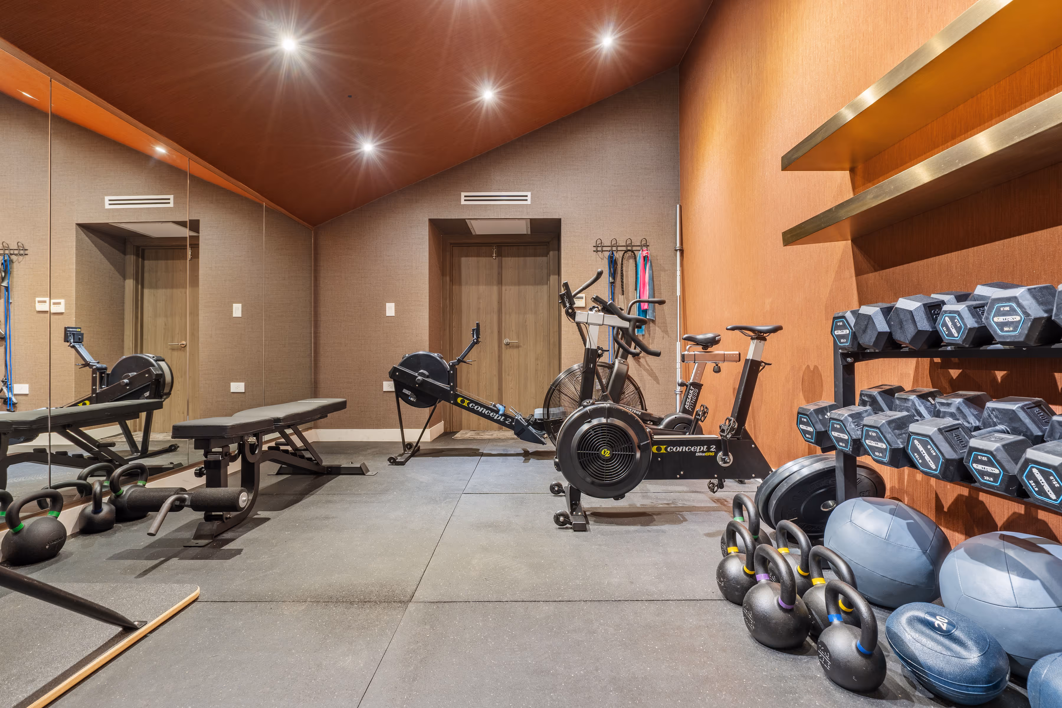 Private home gym inside Caparra Classic penthouse in San Patricio