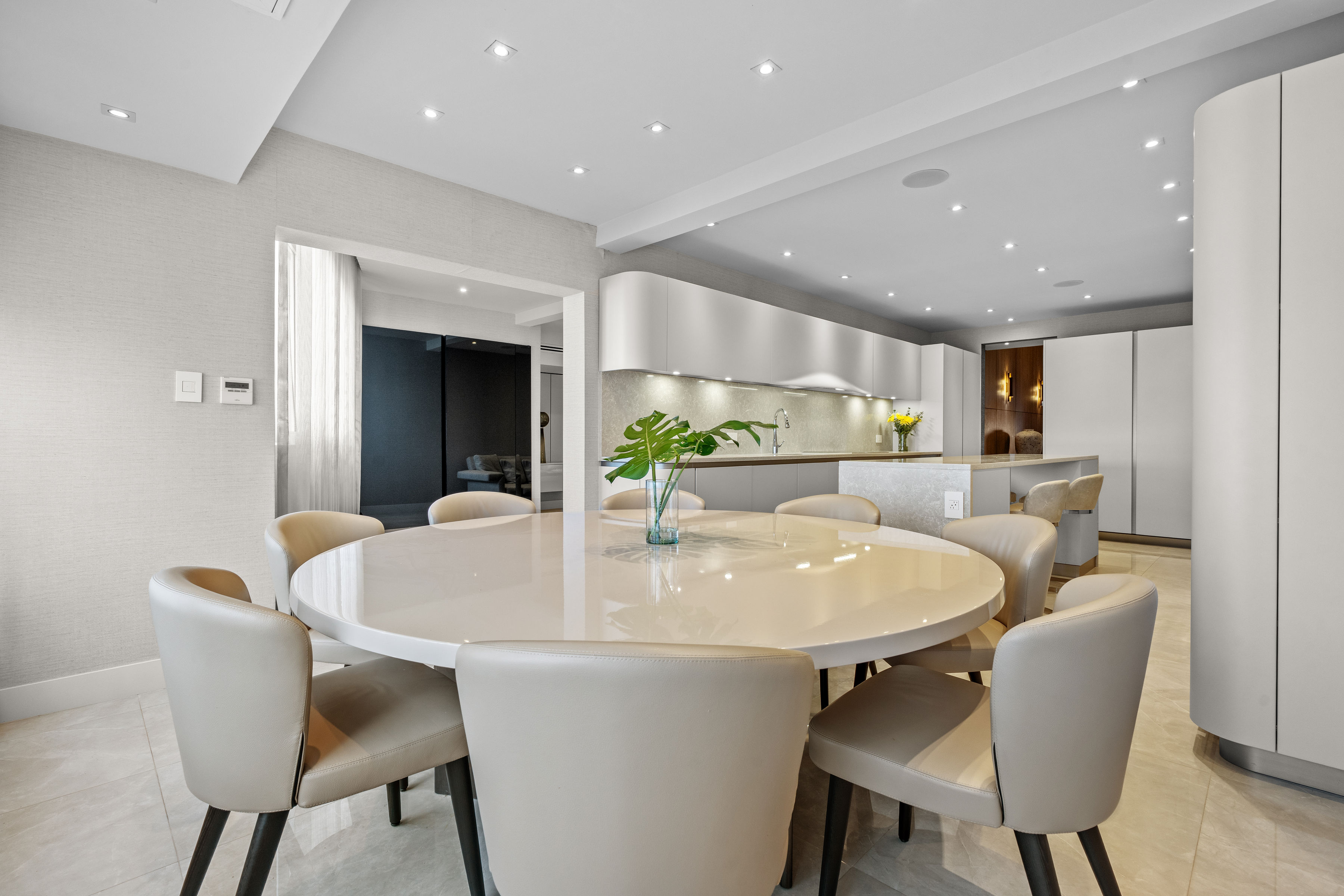 Open concept living and dining area in remodeled Guaynabo penthouse home