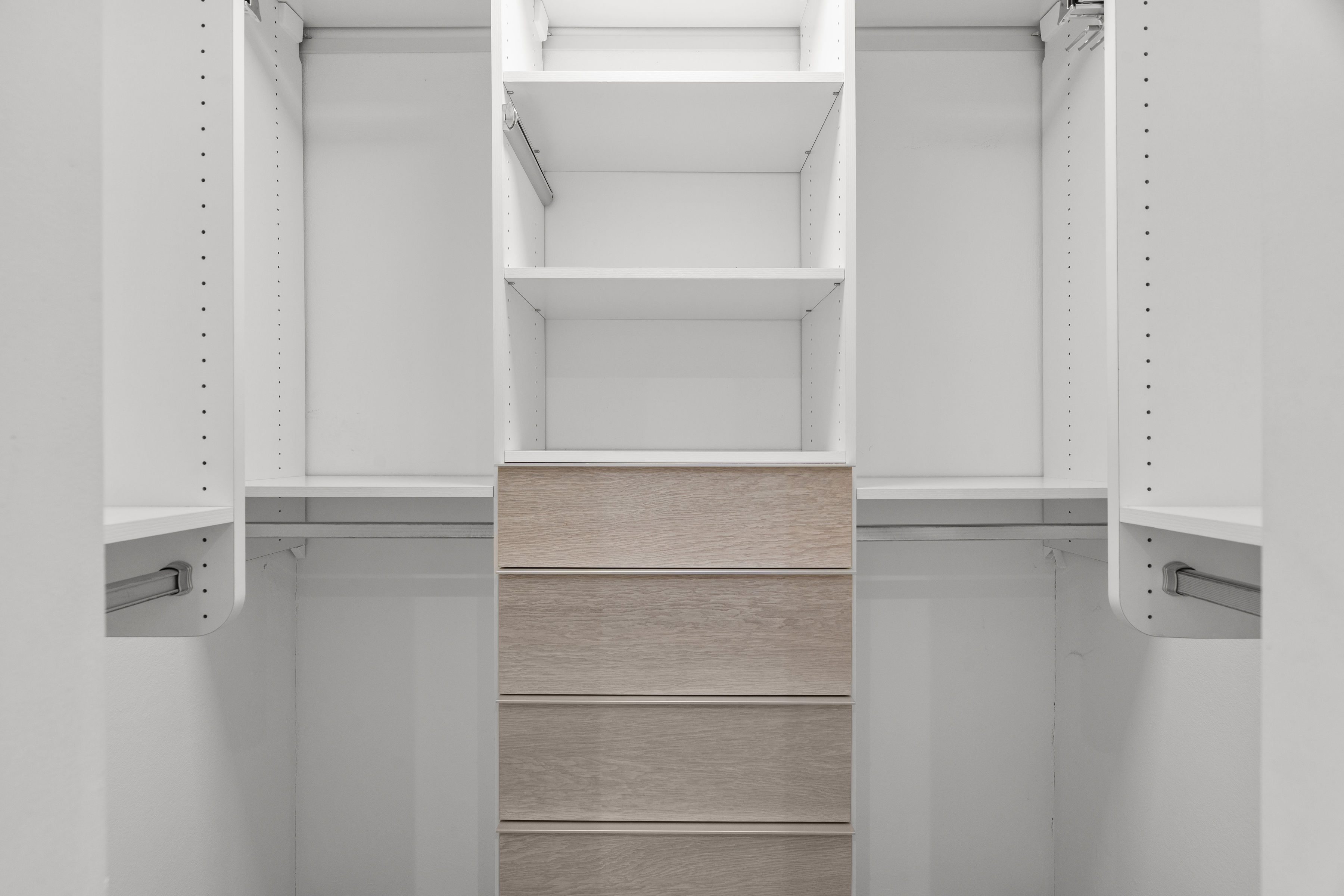 Astralis Isla Verde bedroom with large windows ceiling fan and natural light