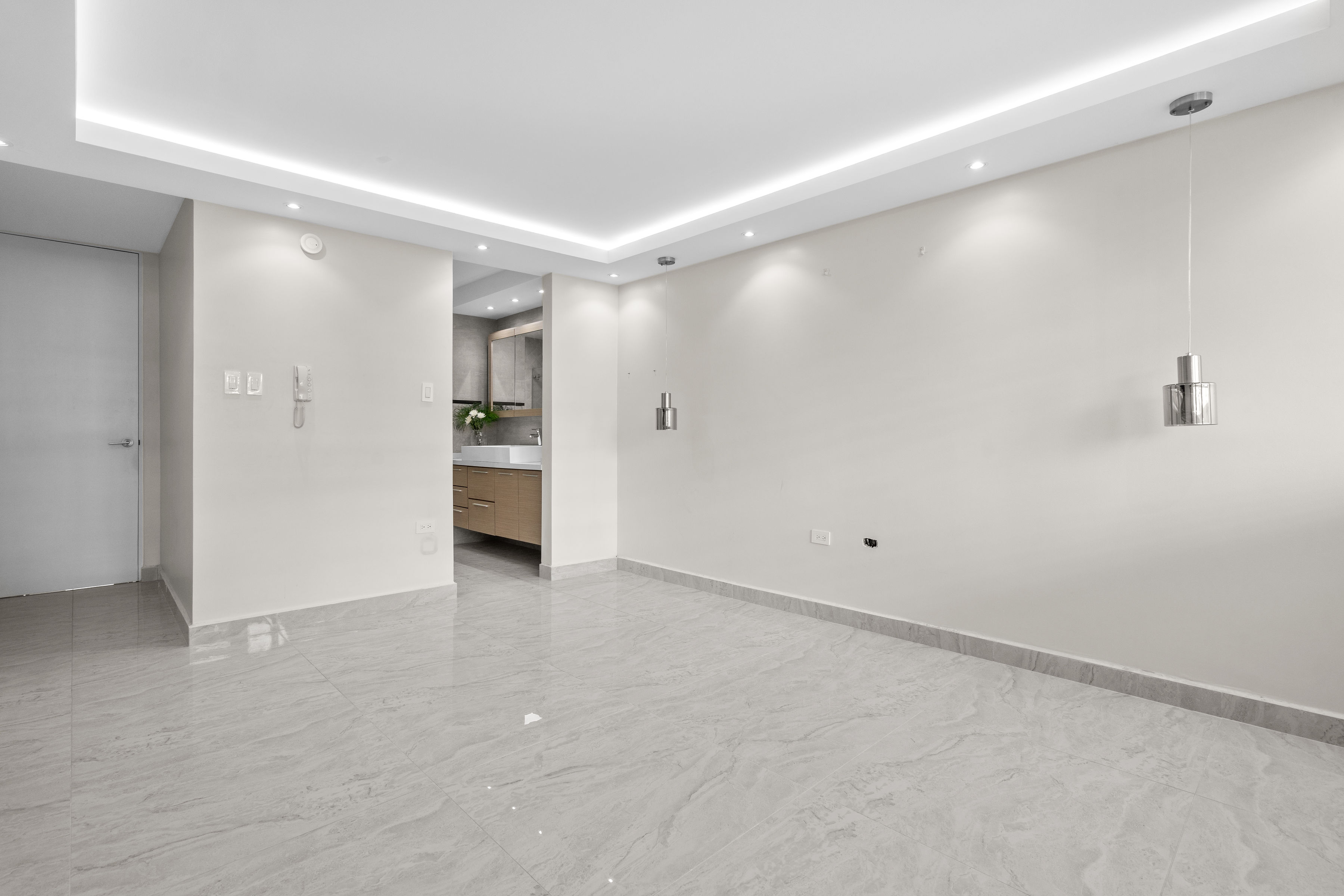 Astralis Residences bathroom with modern vanity walk-in closet and clean contemporary finishes