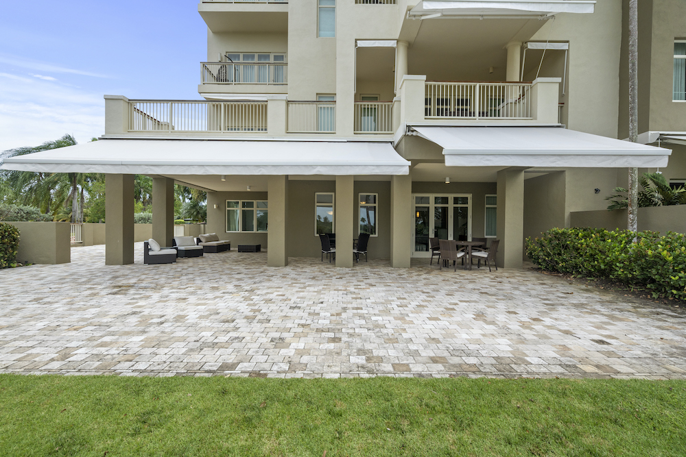 Plantation Village 2-108 exterior view with large private terrace and awnings
