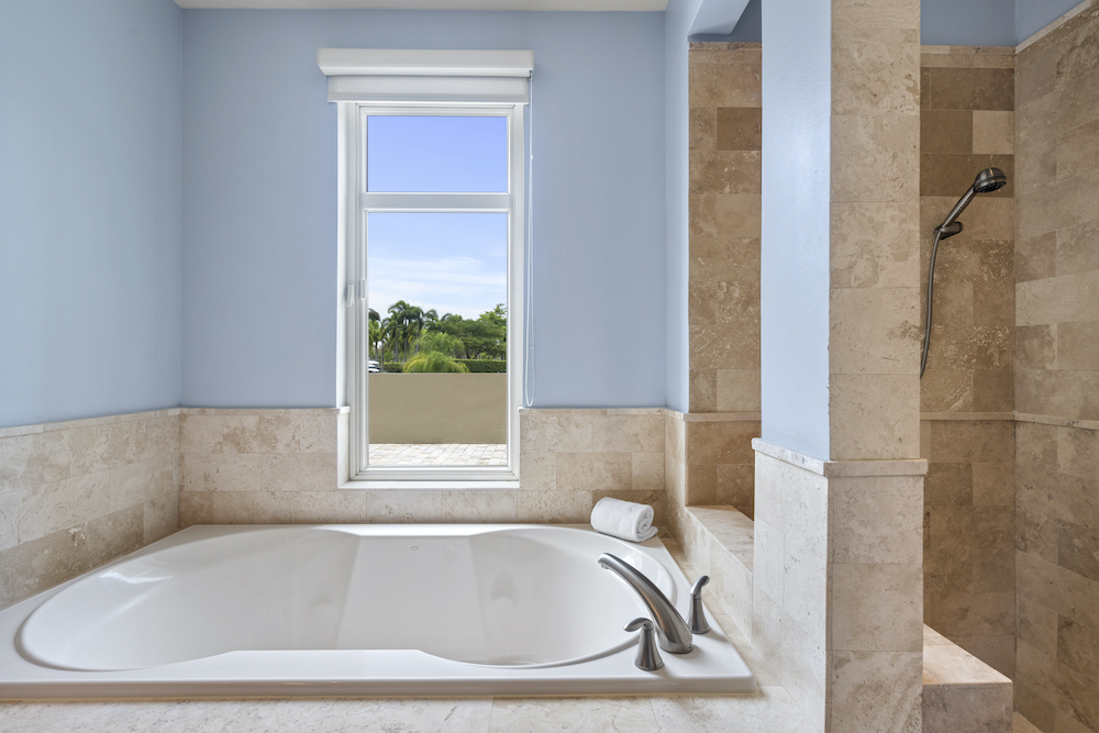 Plantation Village 2-108 bathroom with soaking tub and walk-in shower