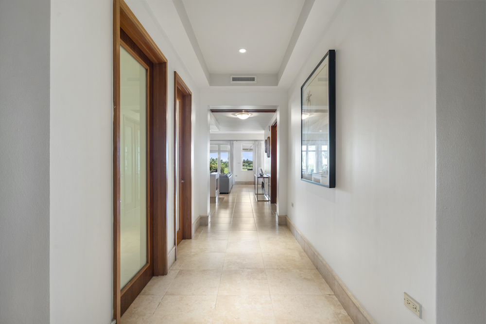 Plantation Village 2-108 hallway leading to open living and dining areas