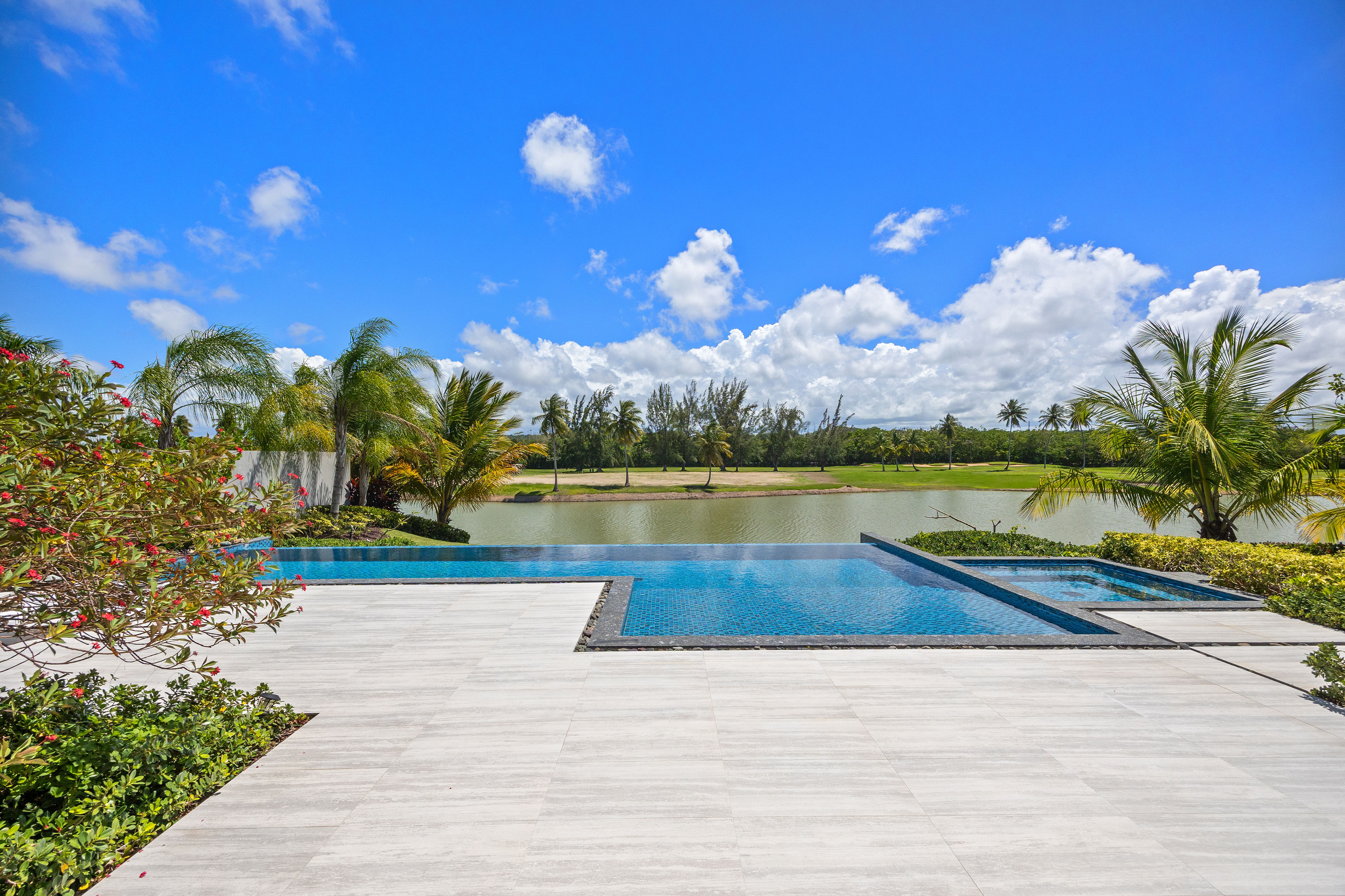 Dorado Beach Resort The Isles residence infinity pool and jacuzzi overlooking lake and golf course views