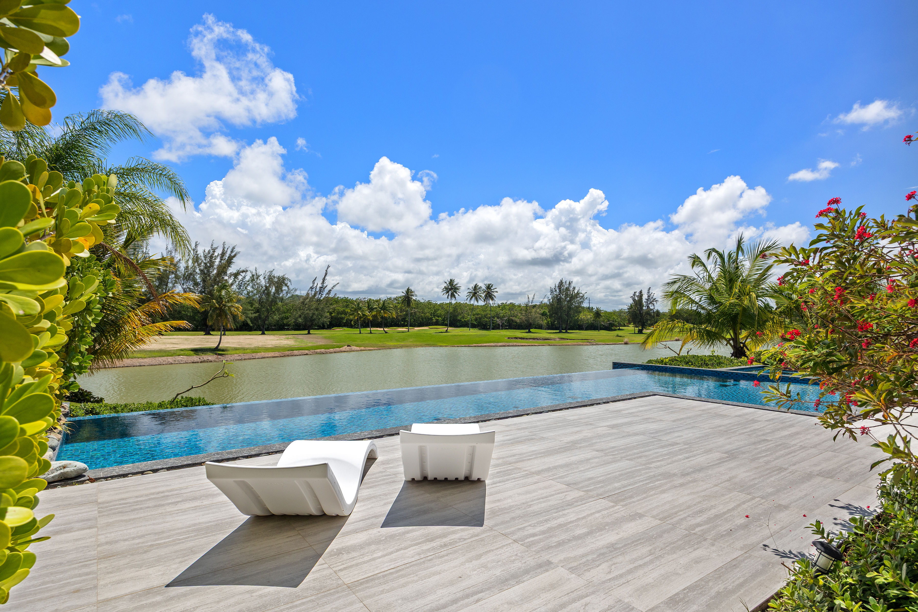 Dorado Beach Resort The Isles residence infinity edge pool overlooking lake and golf course