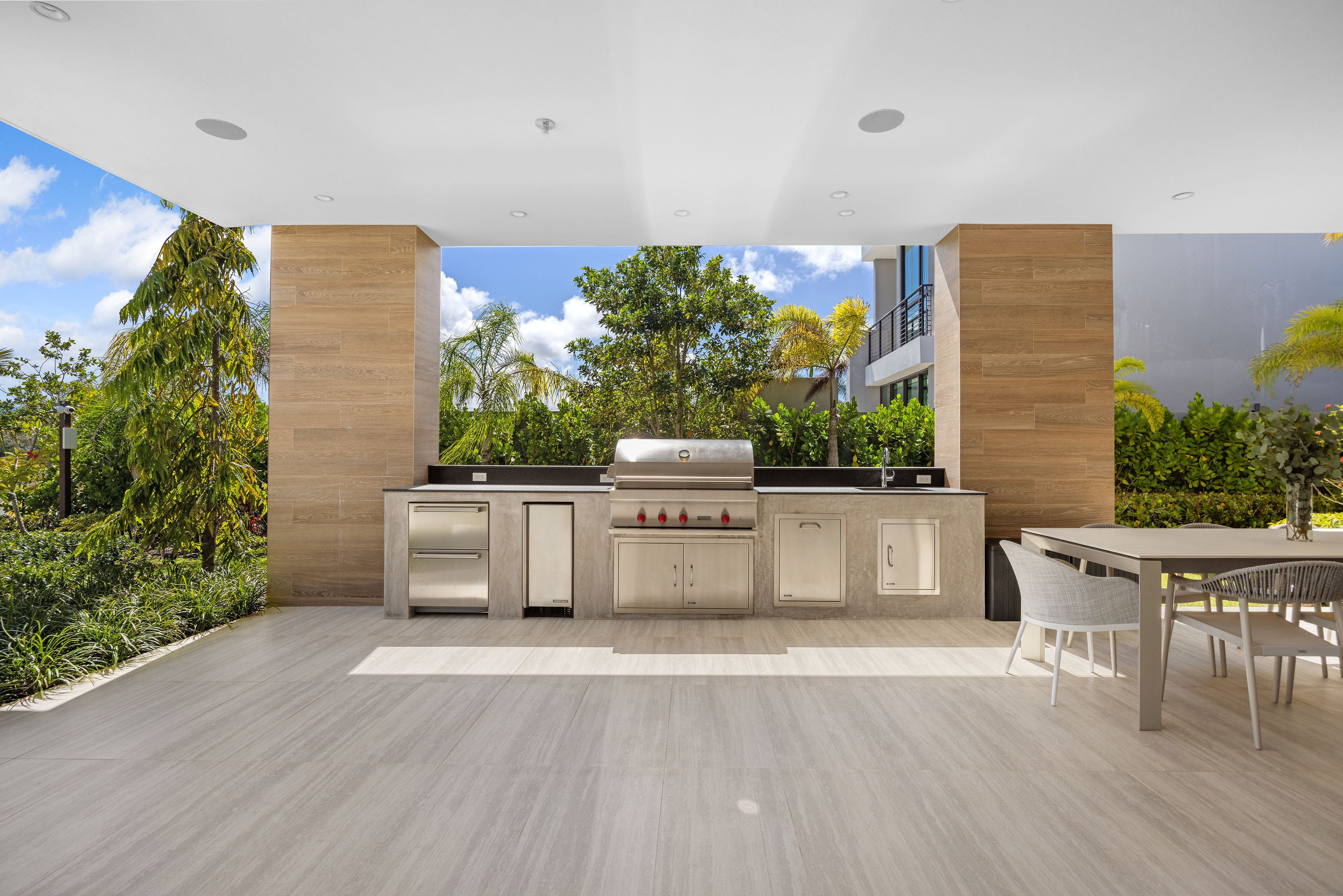 Dorado Beach Resort The Isles residence covered outdoor terrace with built-in BBQ and dining area