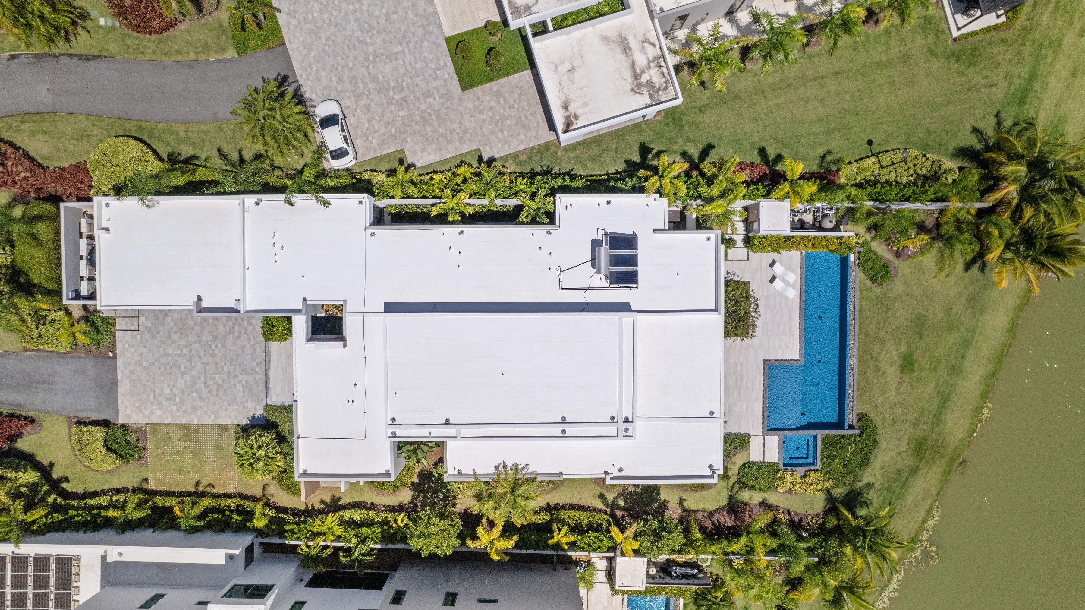 Dorado Beach Resort The Isles residence aerial top view showing roof layout, pool, and lot