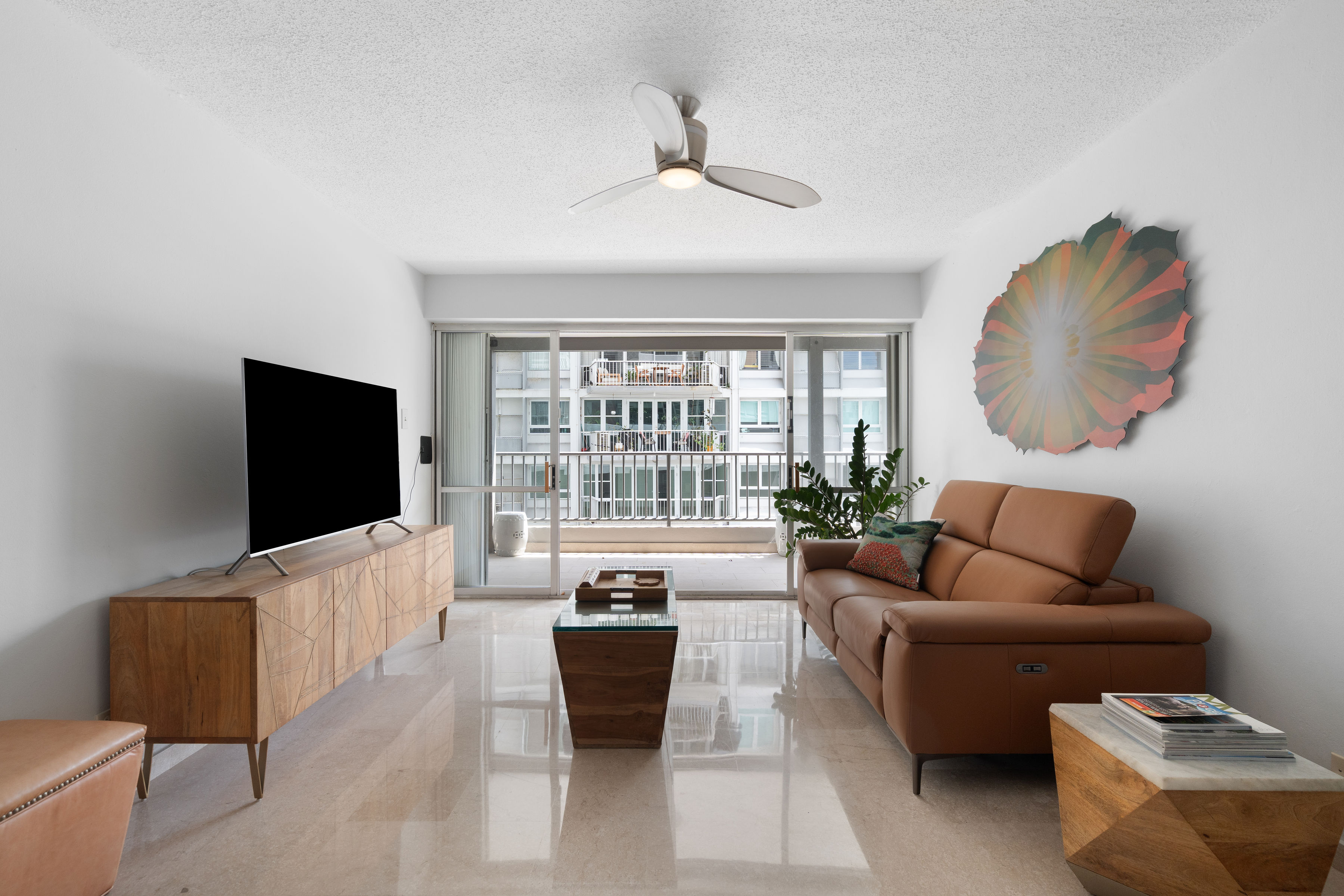 Kings Court 81 Condado | Living room with balcony access and abundant natural light
