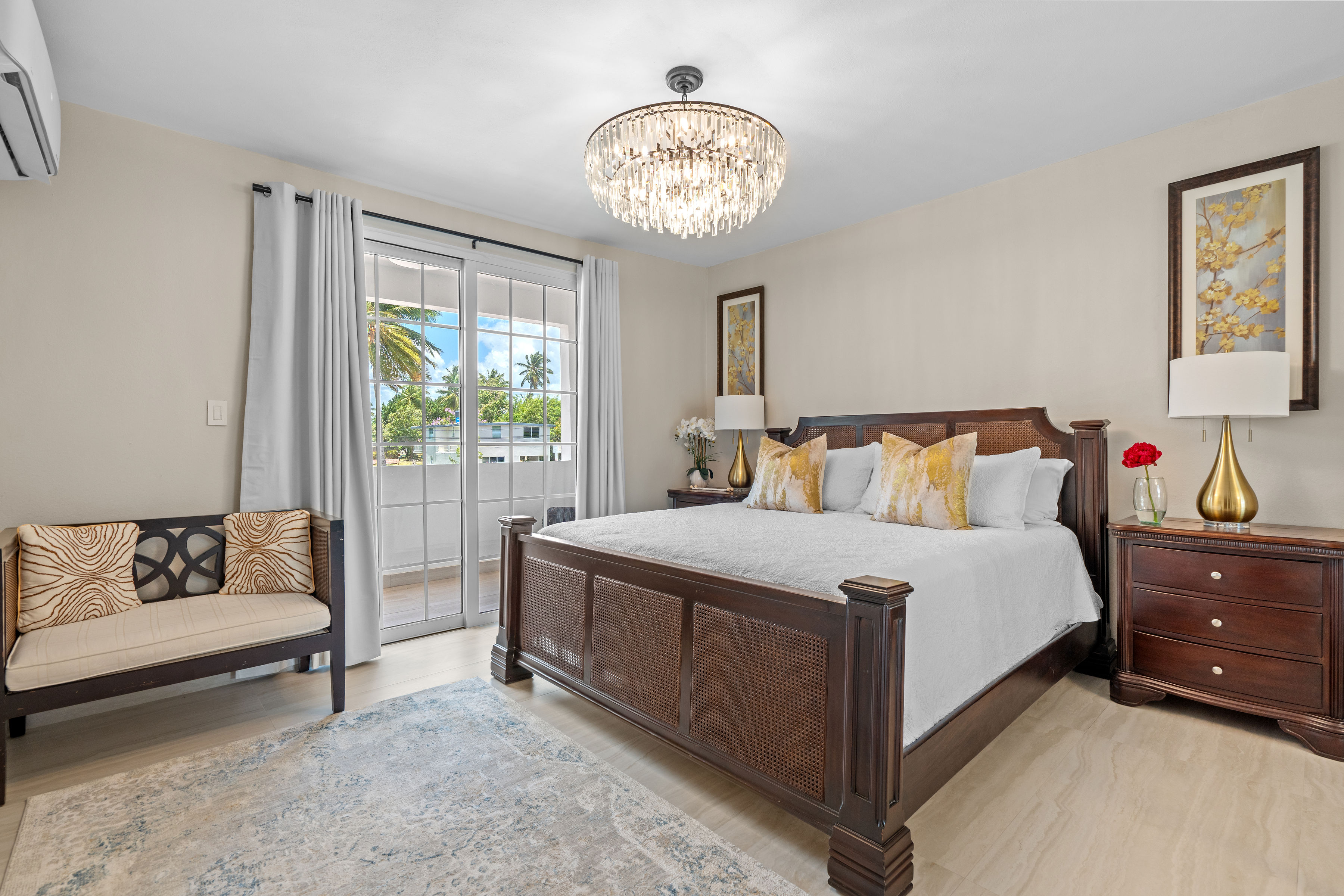 Royal Palm Vega Alta | Covered balcony overlooking tennis courts, palm-lined grounds, and community amenities
