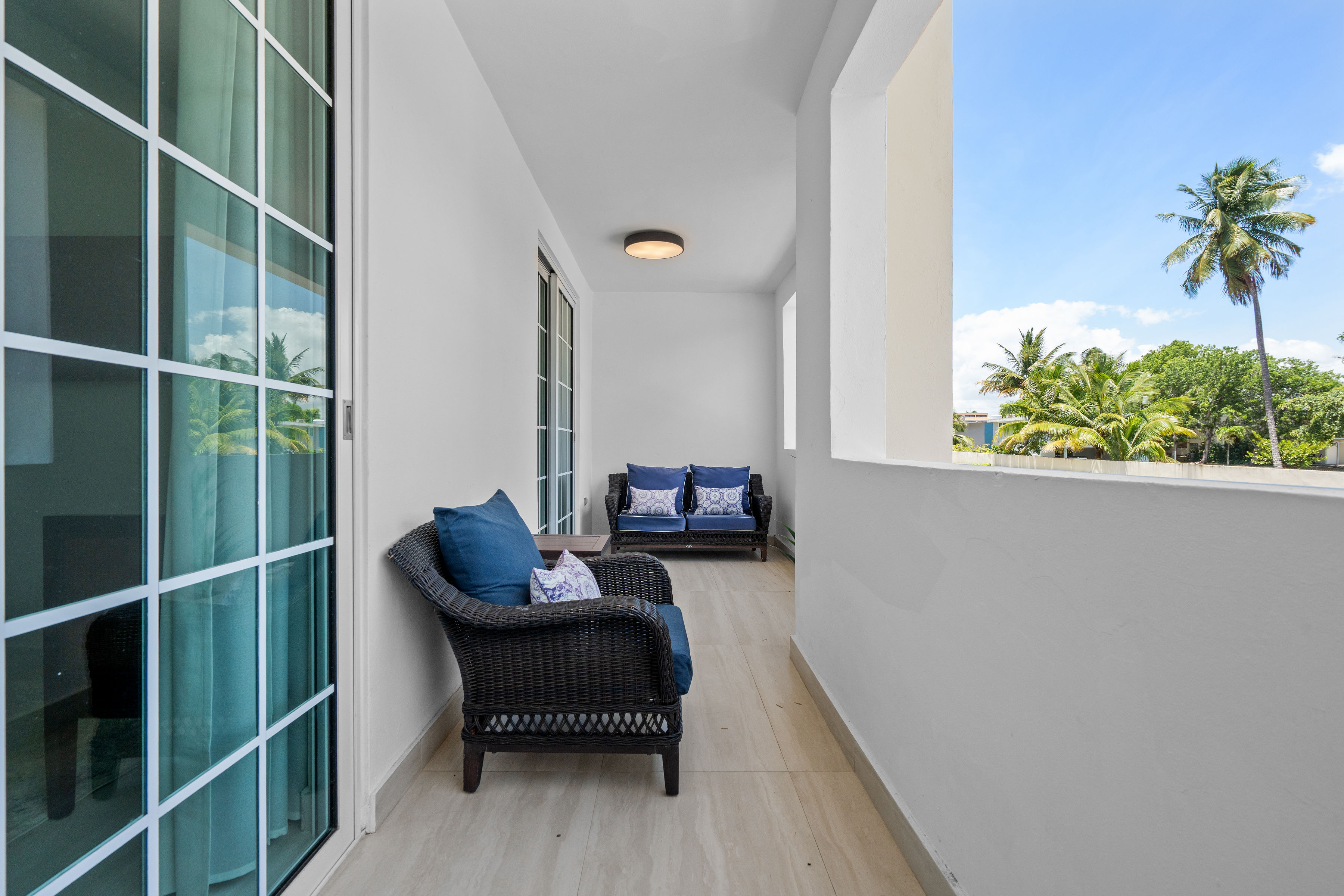 Royal Palm Vega Alta | Secondary bedroom with private balcony and natural light