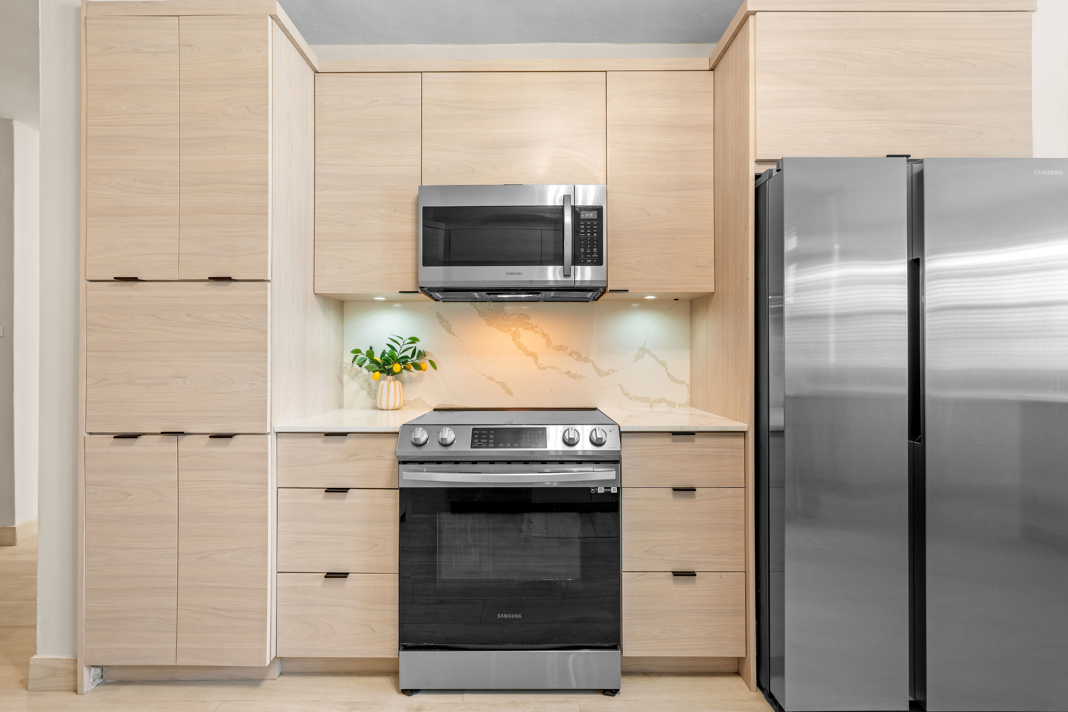 Royal Palm Vega Alta | Chef-inspired kitchen with custom cabinetry and integrated appliances