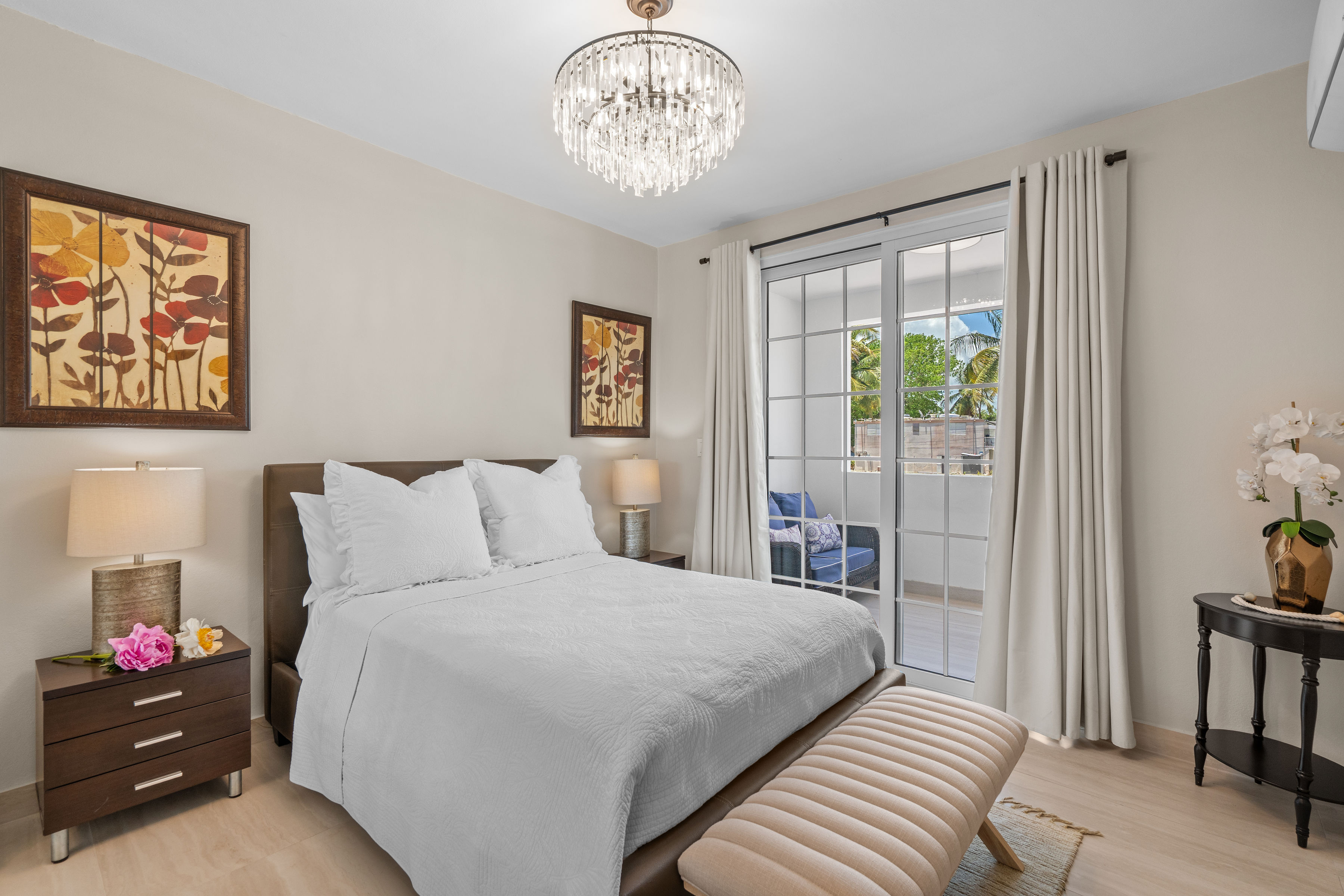 Royal Palm Vega Alta | Private covered balcony connected to a secondary bedroom overlooking tropical surroundings