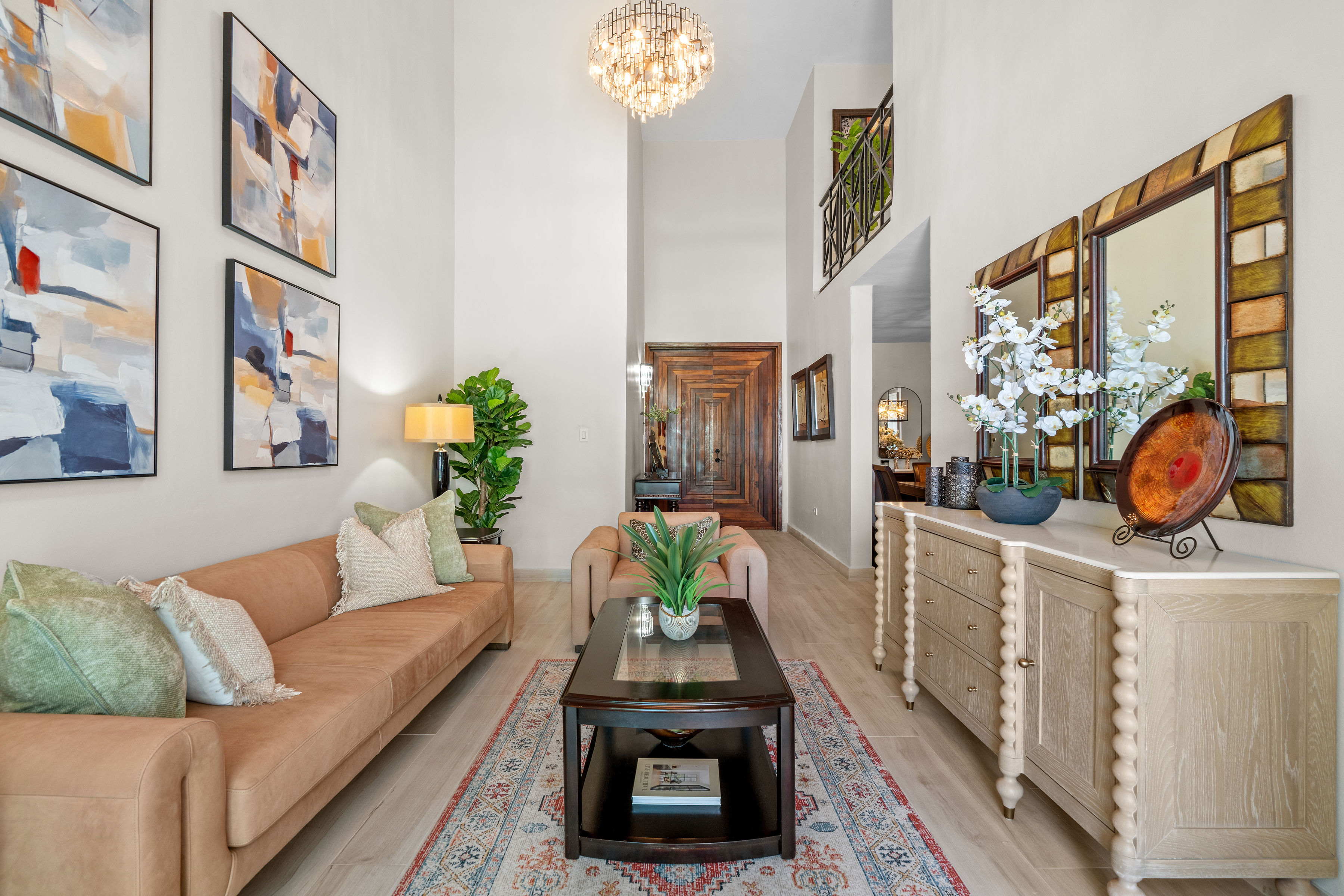 Royal Palm Vega Alta | Living room showcasing double-height ceilings and grand entryway