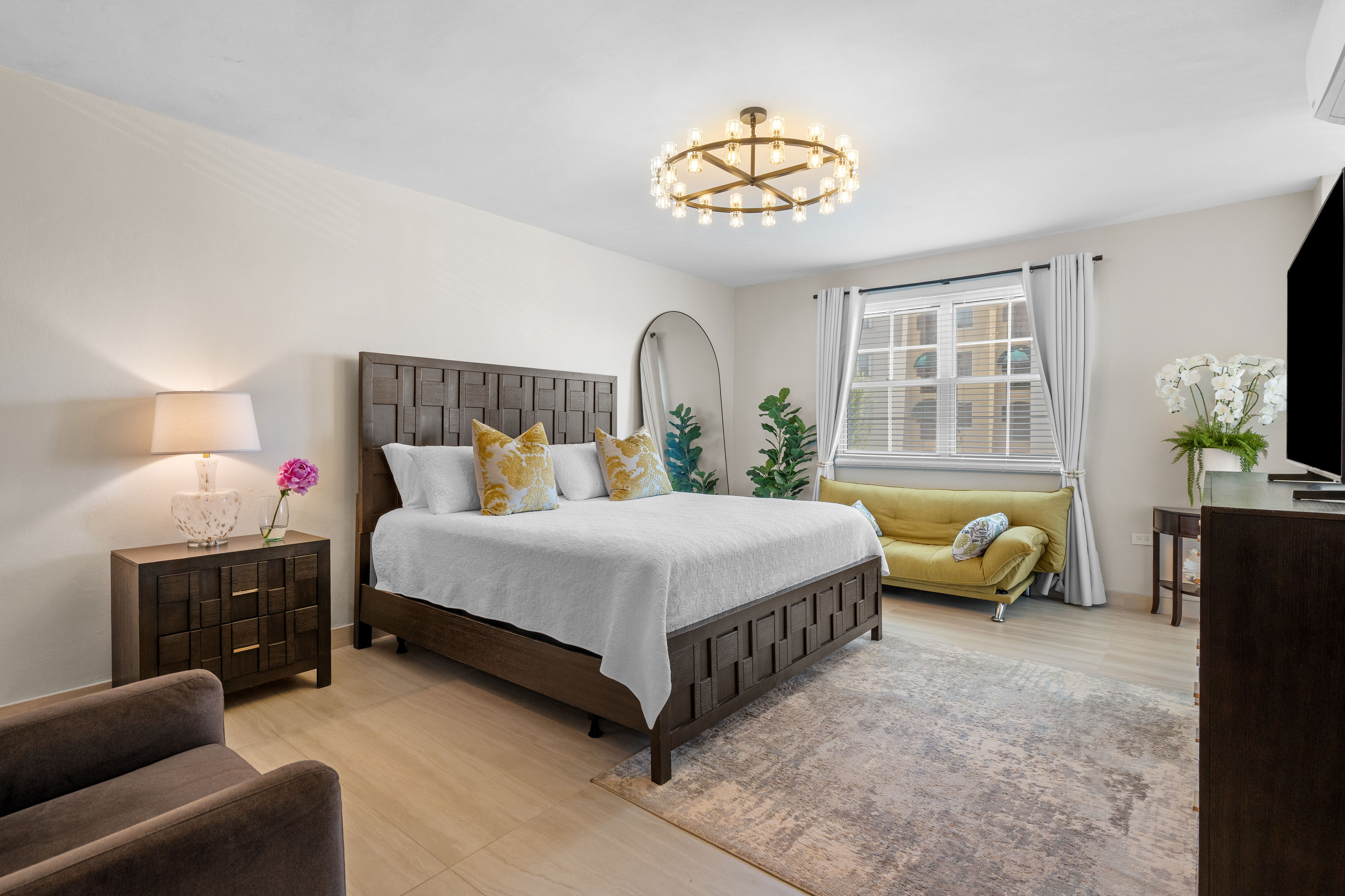 Royal Palm Vega Alta | Second-floor lounge overlooking the double-height living room and primary suite entrance