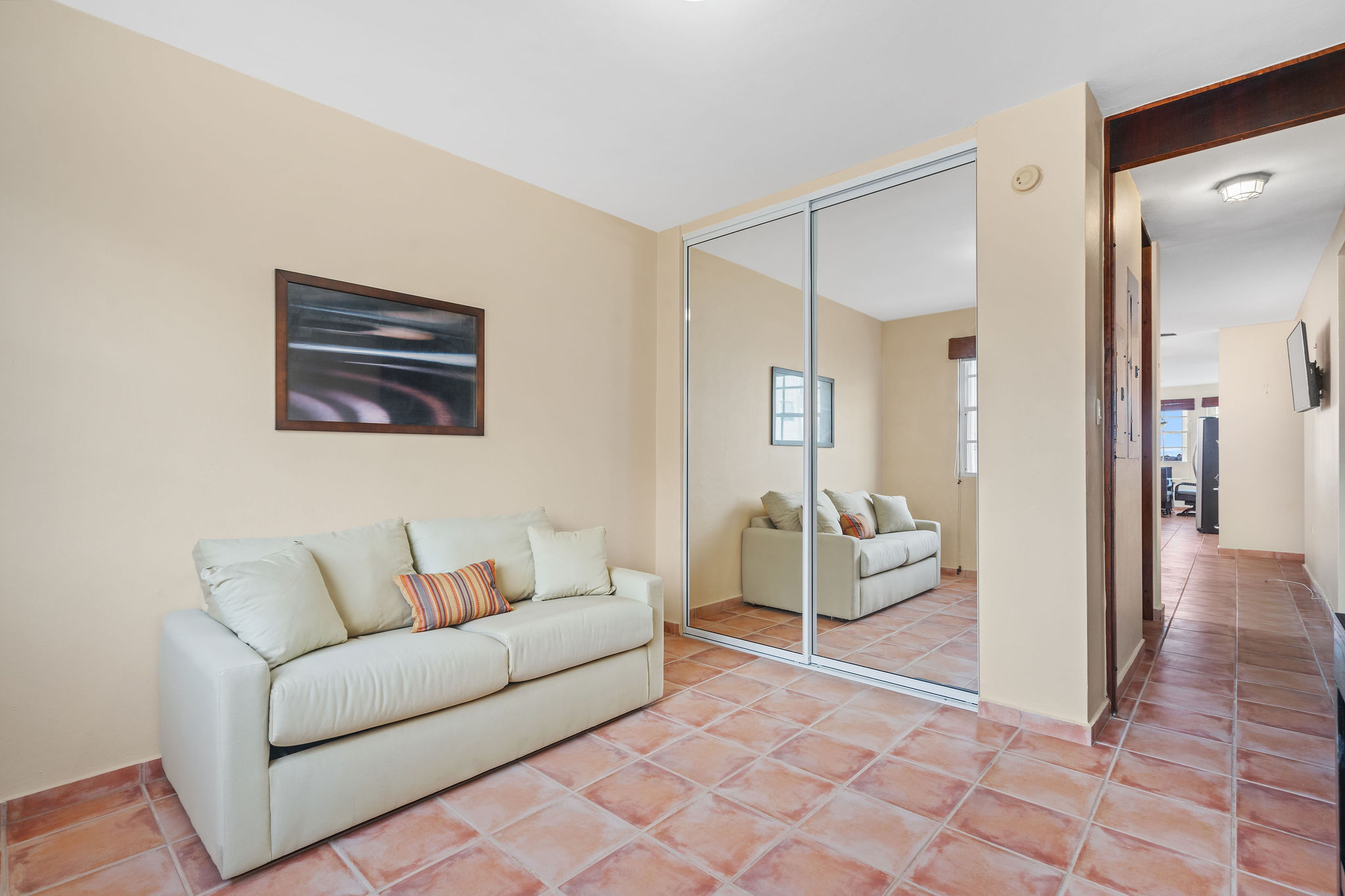 Royal Palm flexible room with mirrored closet and sitting area