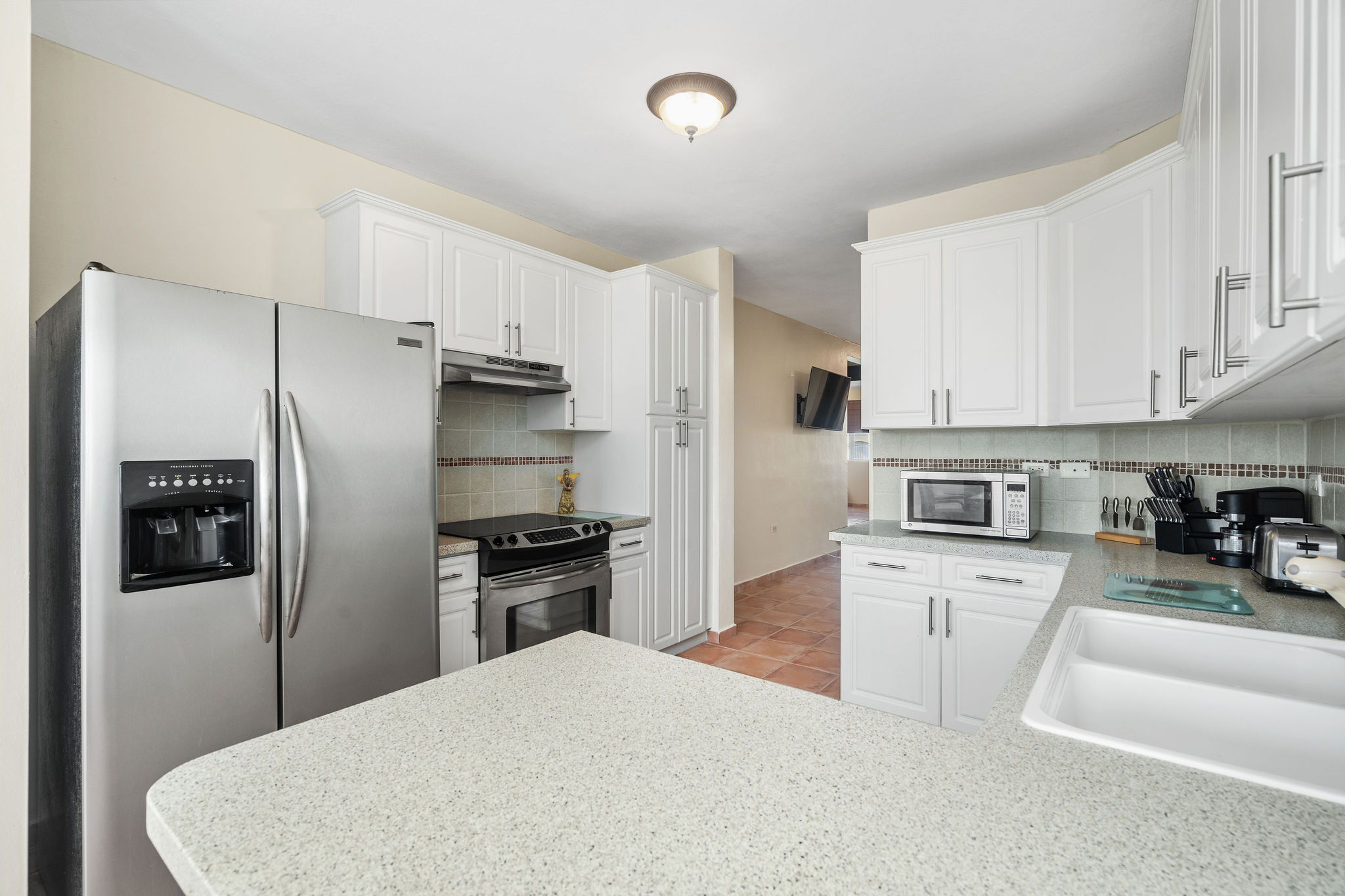 Royal Palm kitchen with stainless steel appliances and ample cabinetry