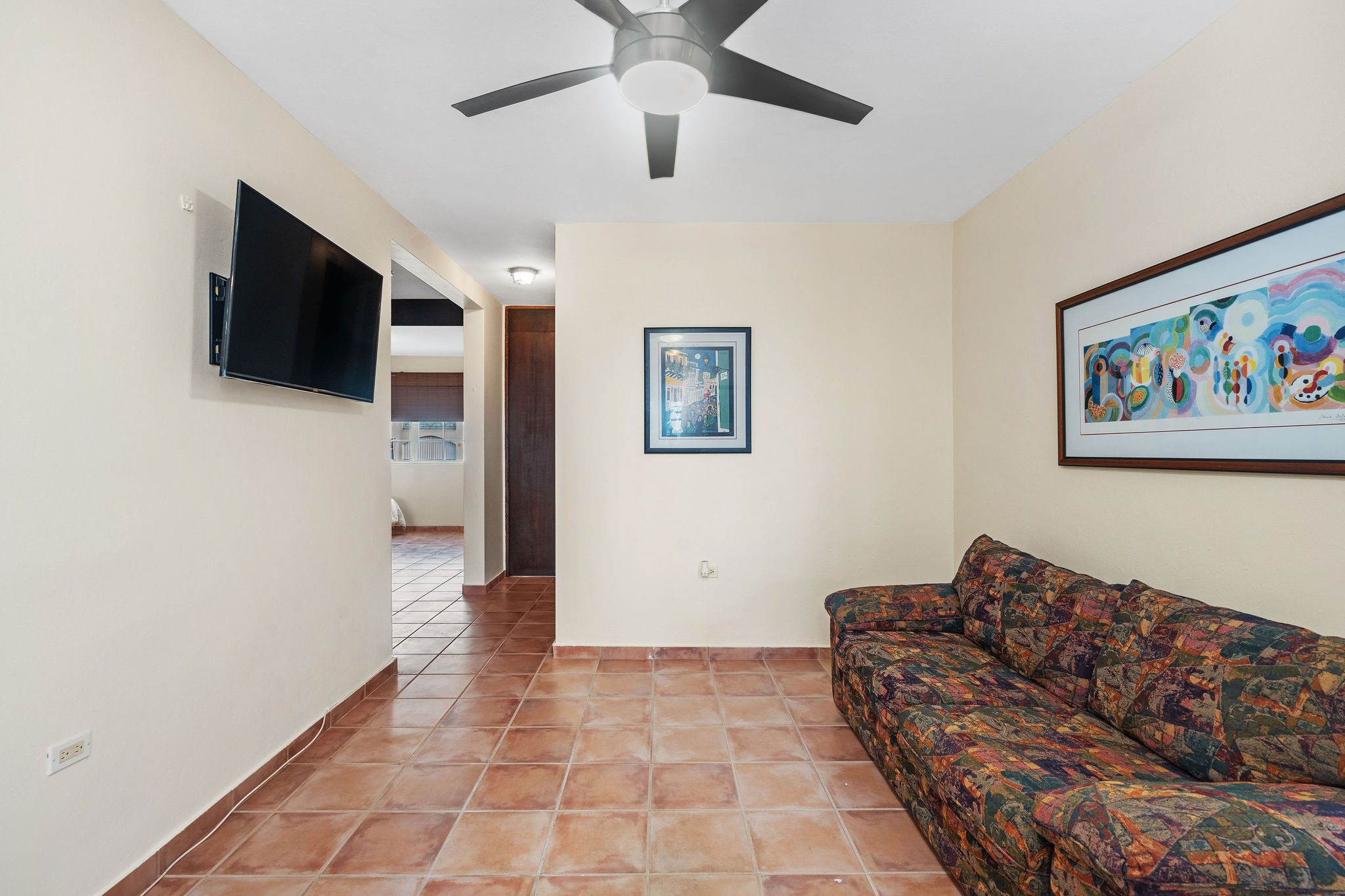 Royal Palm bedroom with spacious layout and ceiling fan