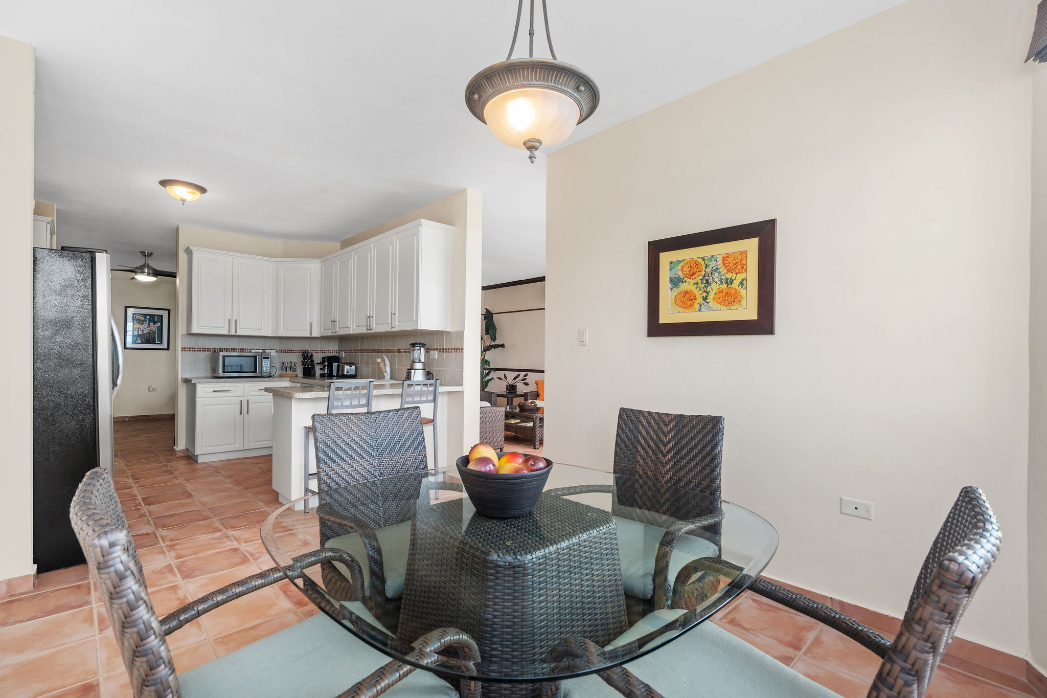 Royal Palm open-concept dining area connecting to the kitchen