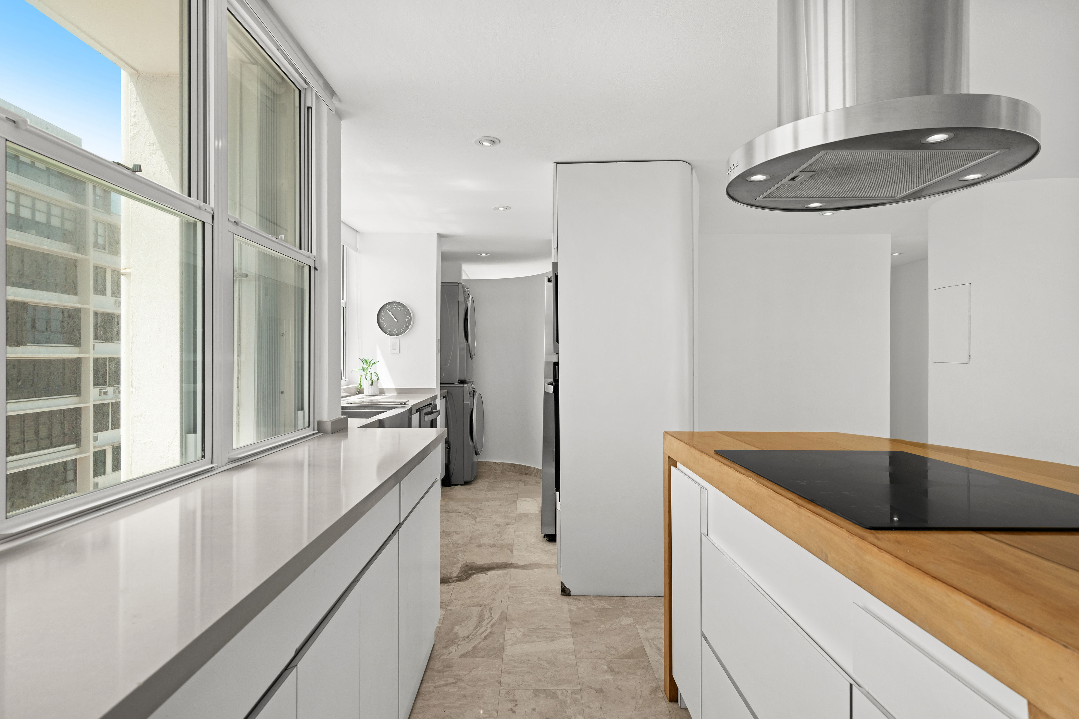 Las Olas Condado renovated kitchen with induction cooktop and city views