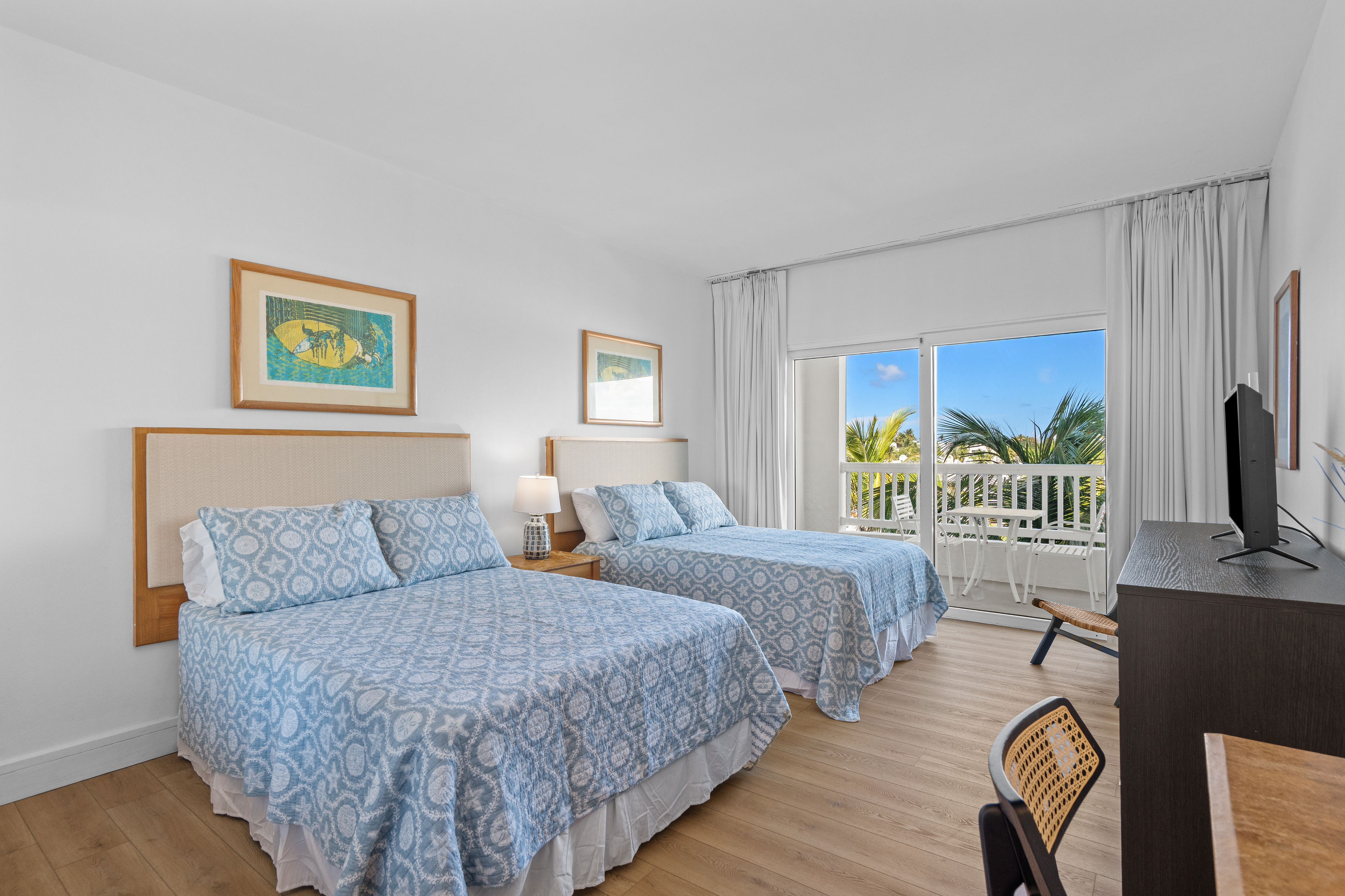Embassy Villas, Dorado del Mar | Guest bedroom with two beds, workspace, and views toward the coast