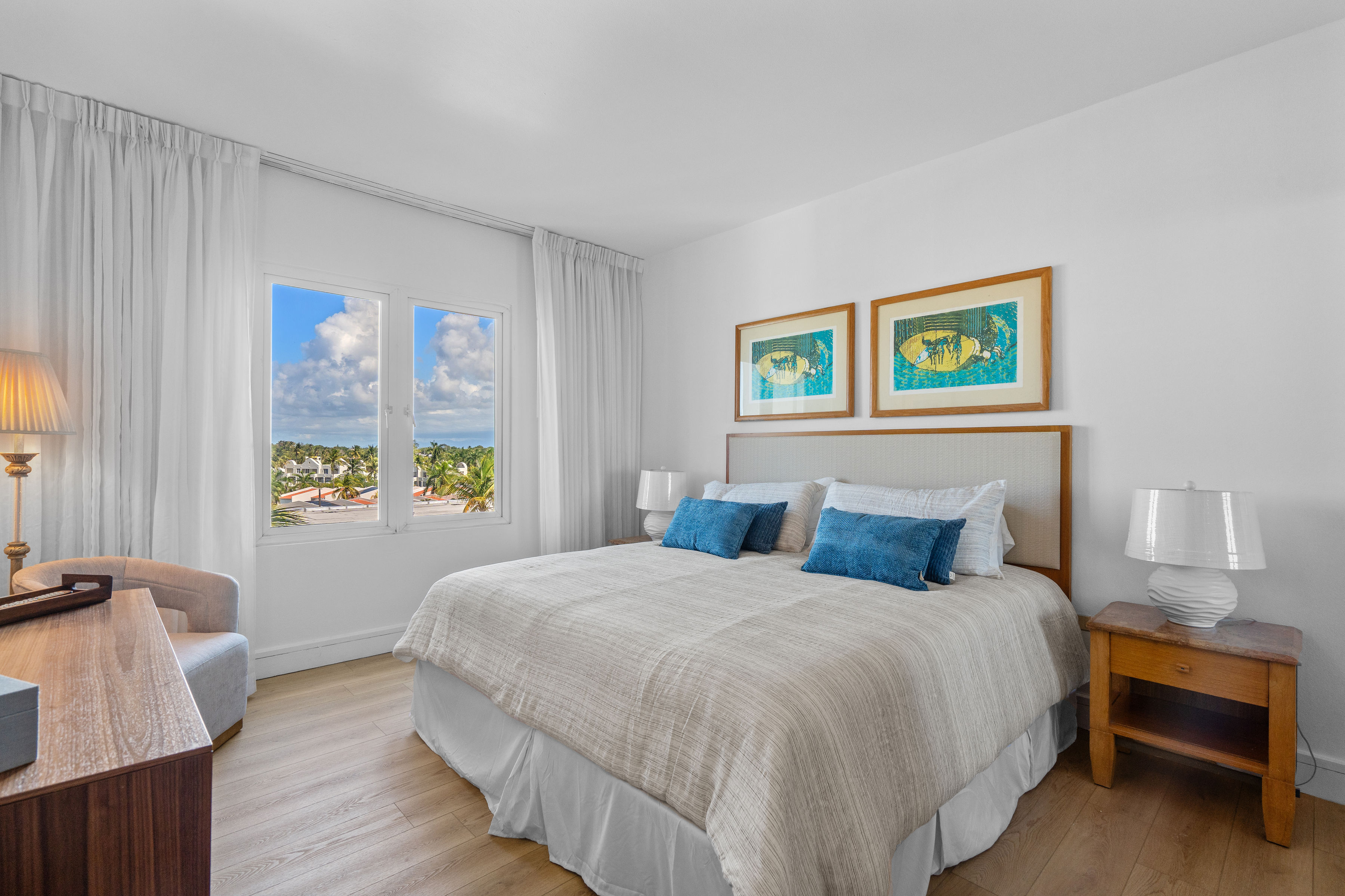 Embassy Villas, Dorado del Mar | Primary bedroom with king bed, large windows, and natural light