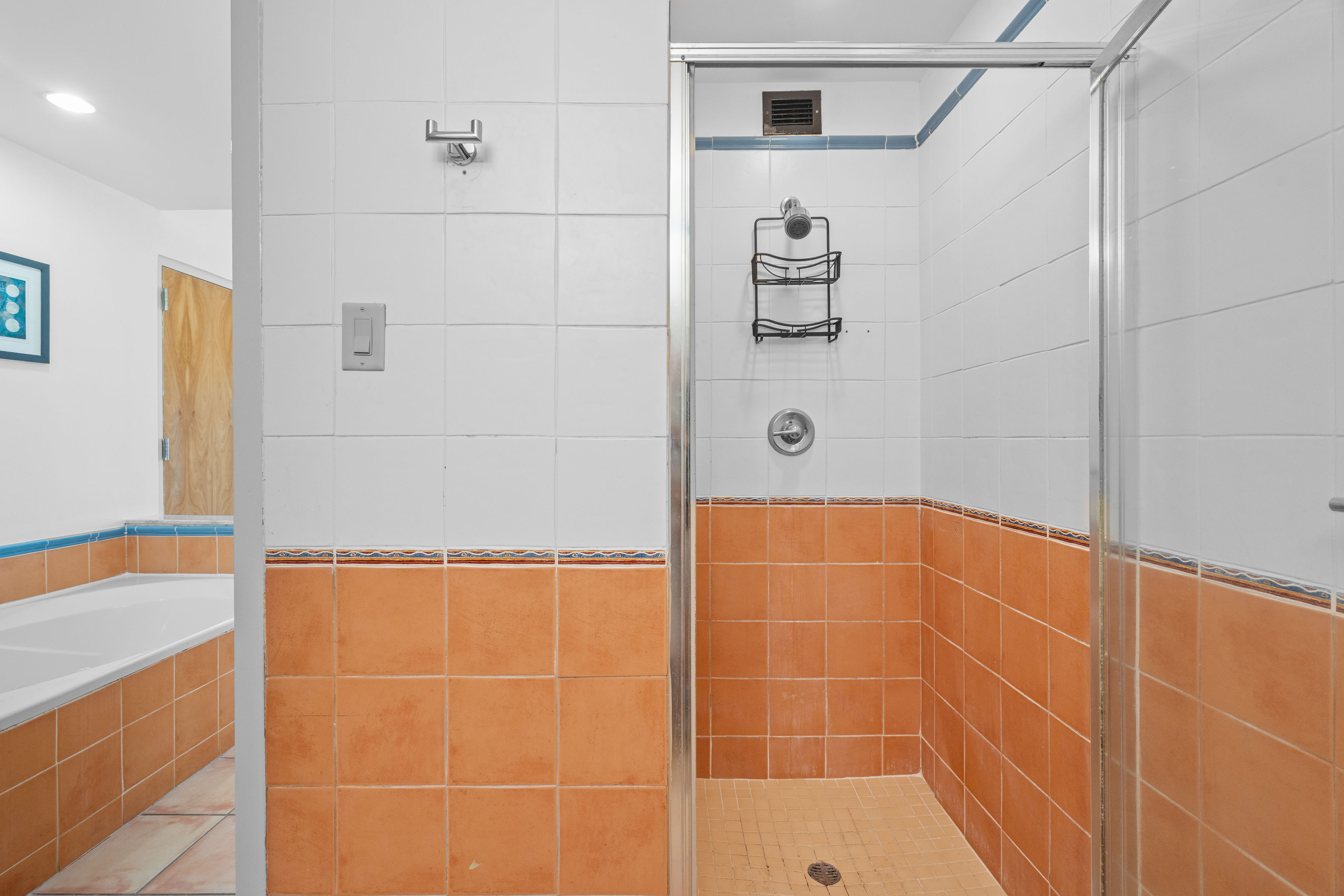 Embassy Villas, Dorado del Mar | Primary bathroom with glass-enclosed walk-in shower and tiled walls