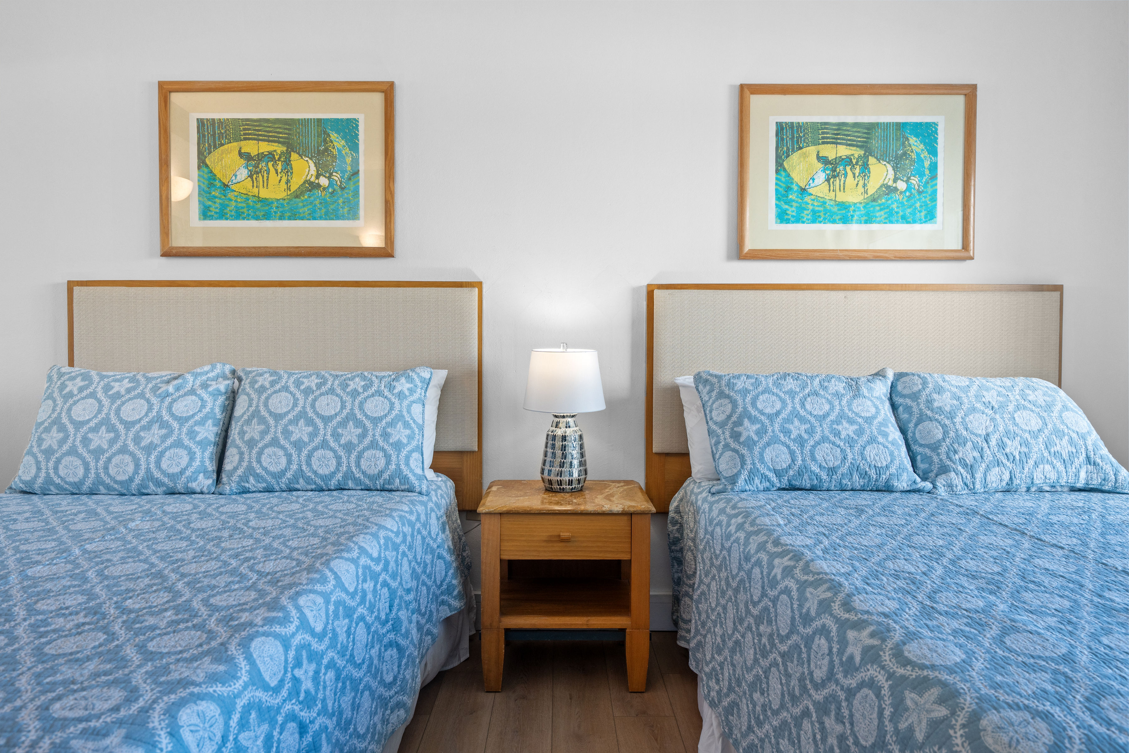 Embassy Villas, Dorado del Mar | Guest bedroom with two beds and coordinated coastal-inspired furnishings