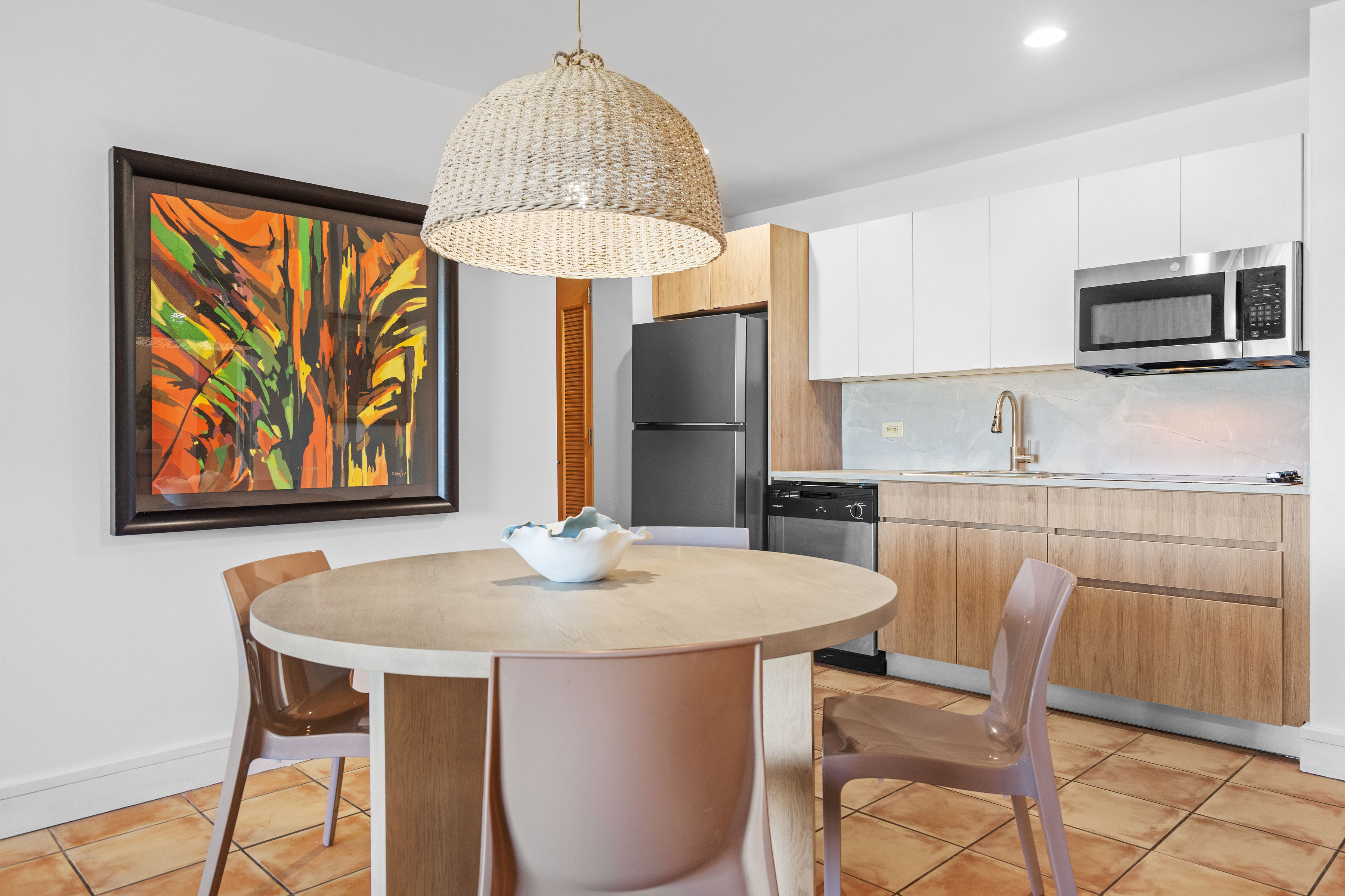 Embassy Villas, Dorado del Mar | Dining area beside the renovated kitchen with breakfast counter