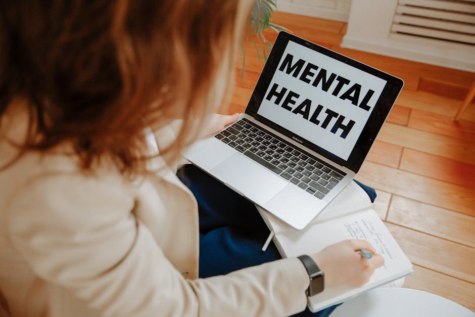 person on a laptop participating in a virtual therapy session - eating disorder therapy Southlake
