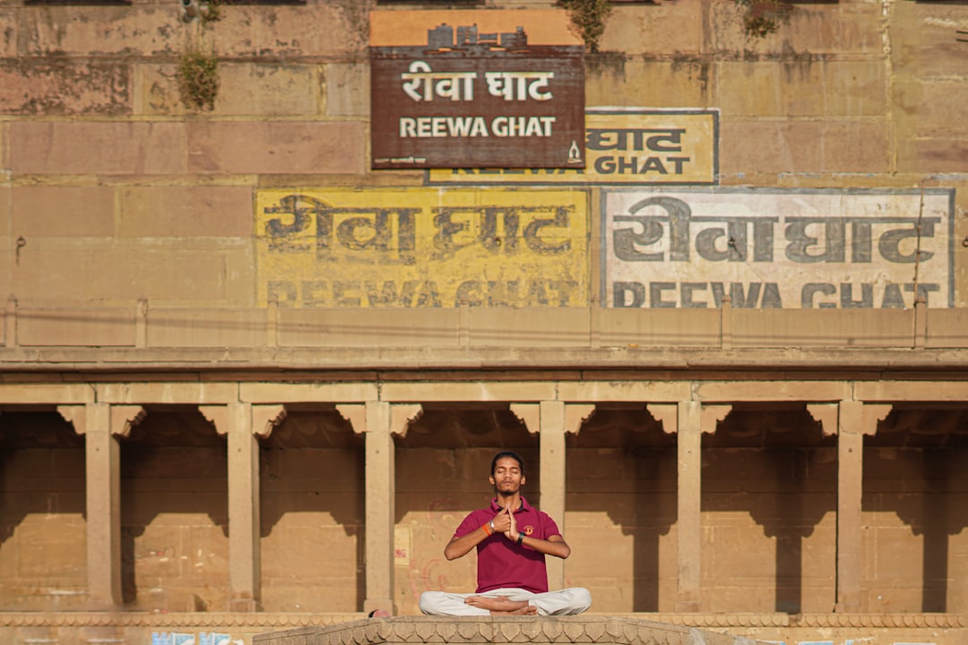 person meditating peacefully - how to manage stress