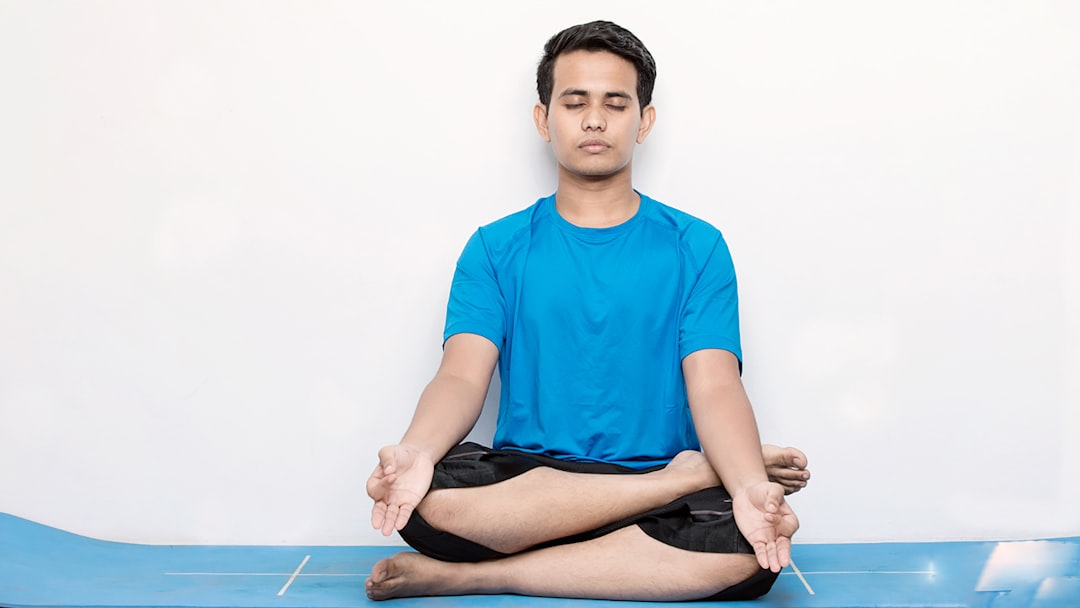 person in a calm and focused meditation posture - meditations for the anxious