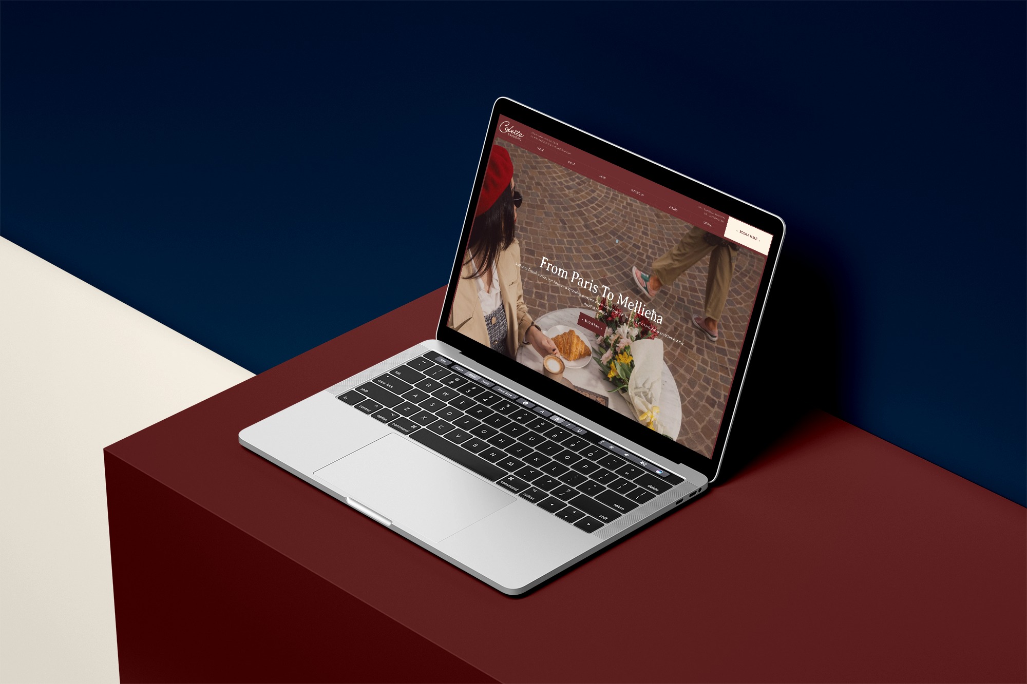 Side view of a laptop showing the website home page