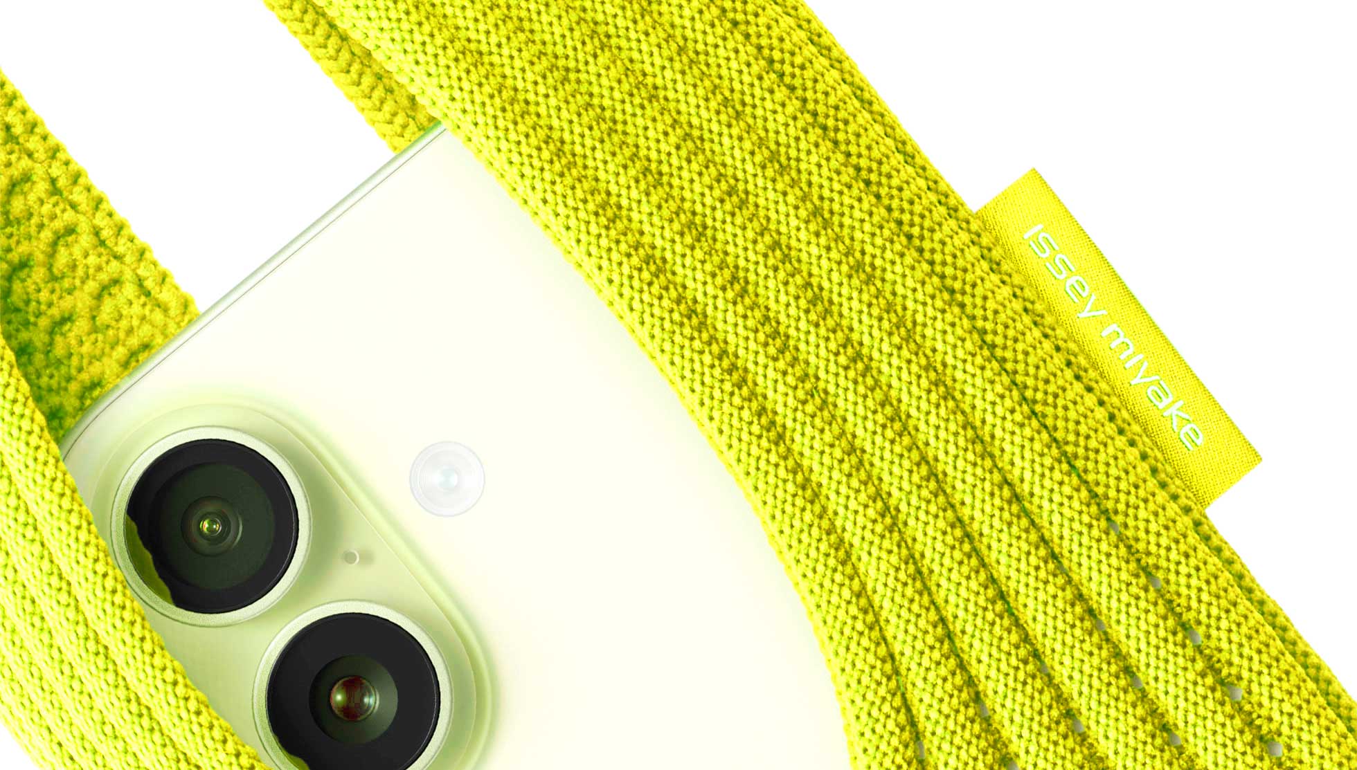 Models wearing Apple iPhone Pocket accessories by ISSEY MIYAKE, shown the lemon yellow version and black long-strap designs as wearable tech fashion.