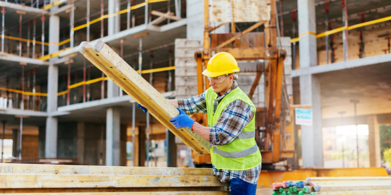 Construction worker moving inventory thanks to a Bizcap bad credit business loan