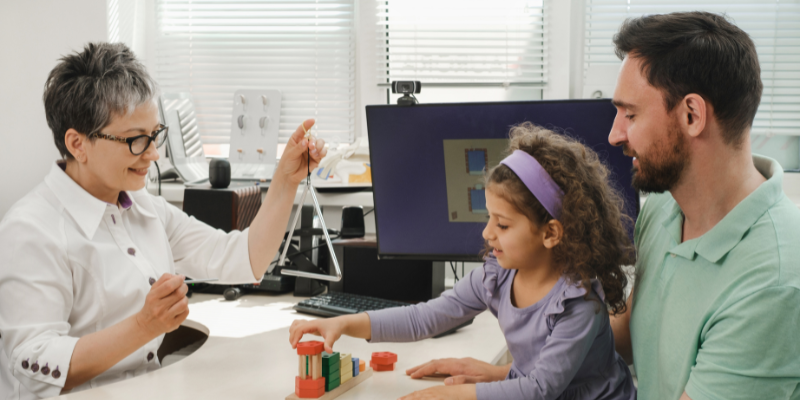 Speech therapist helping a child over the holidays 
