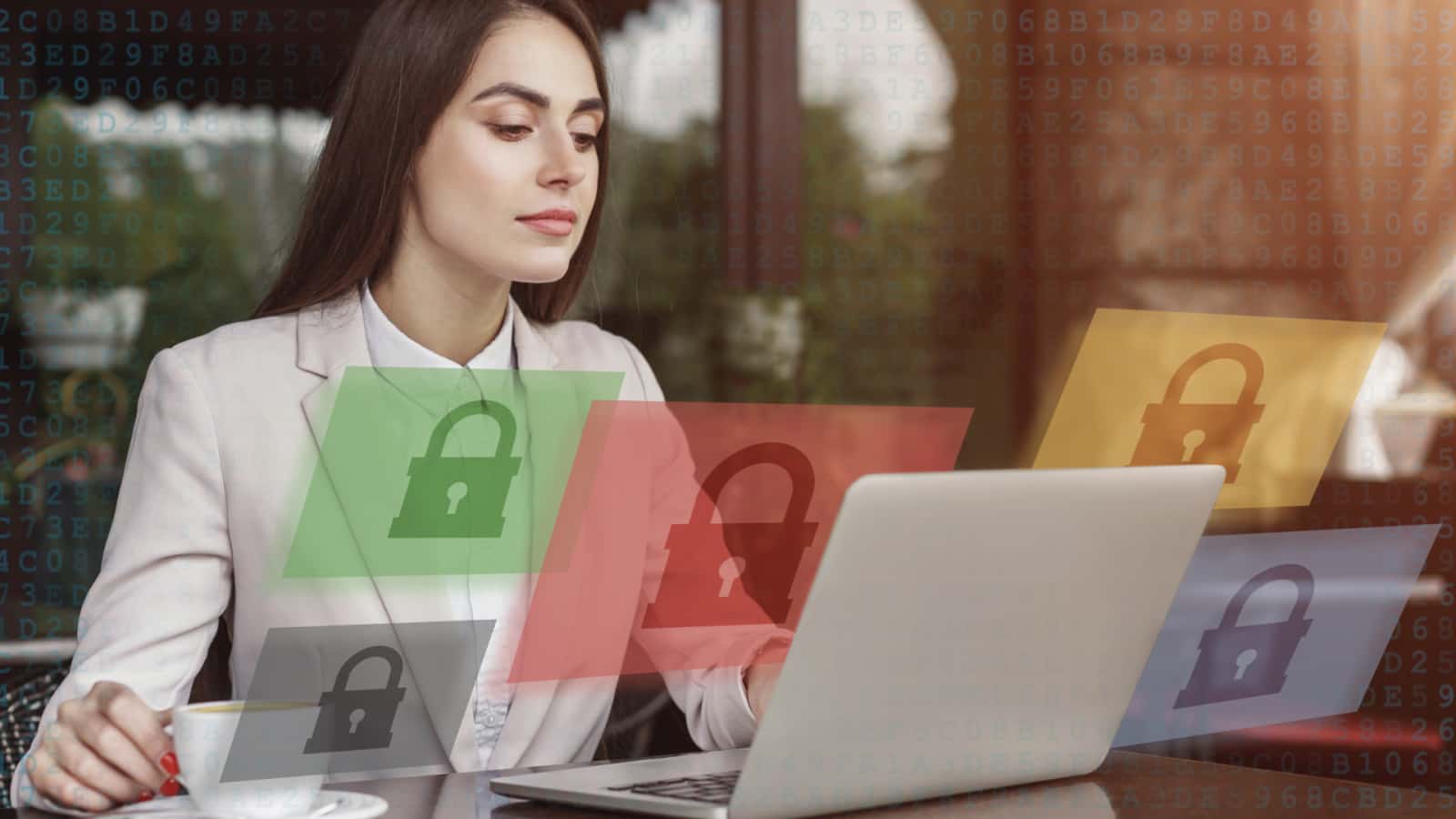Employee using a laptop with digital padlock symbols representing workplace cybersecurity.