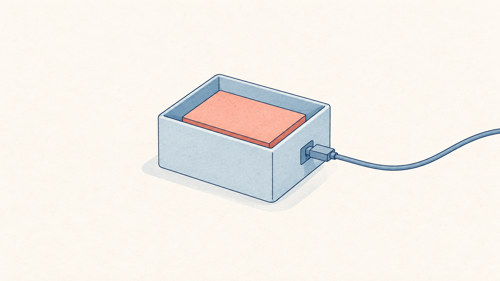 A pale blue storage box holding a coral block, with a cable connected to its side.