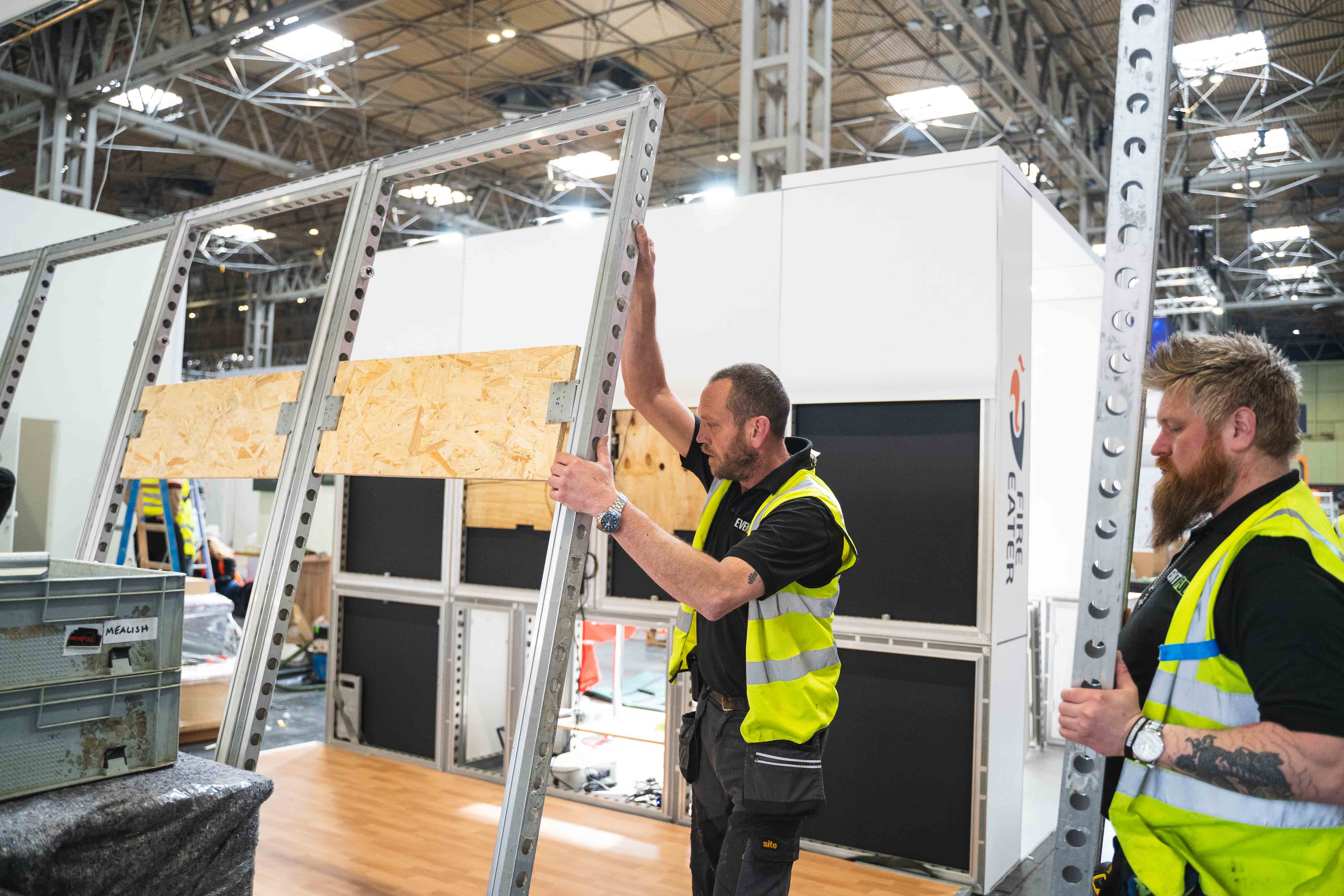 EventFull stand builders installing a modular exhibition stand. 