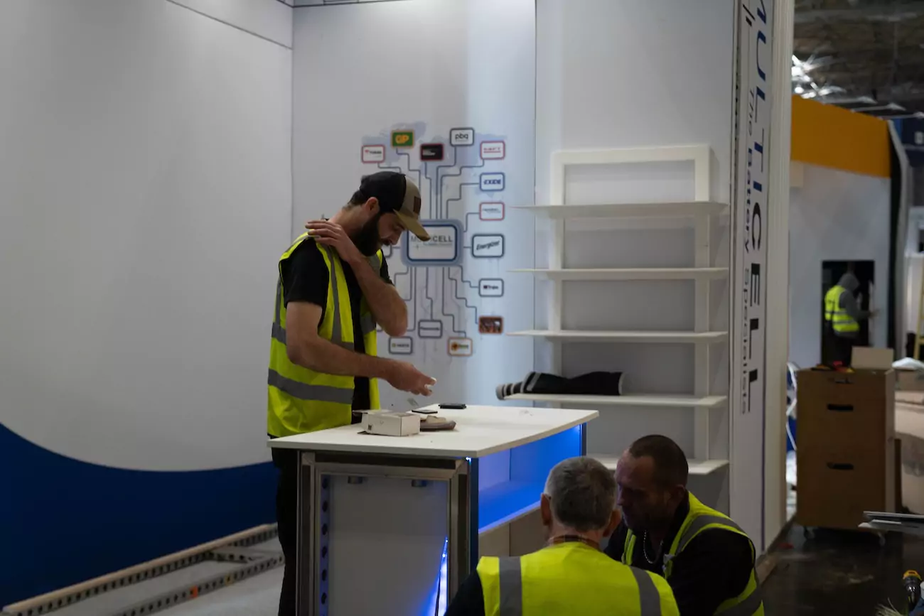 EventFull project manager & stand builders installing an exhibition stand. 