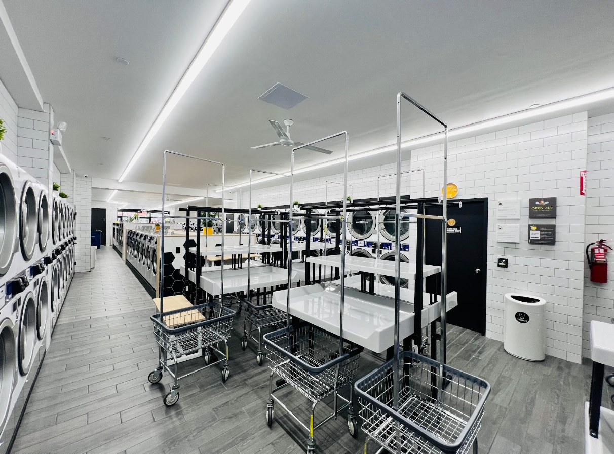 Folding tables and laundry carts at LaundryBee Bushwick
