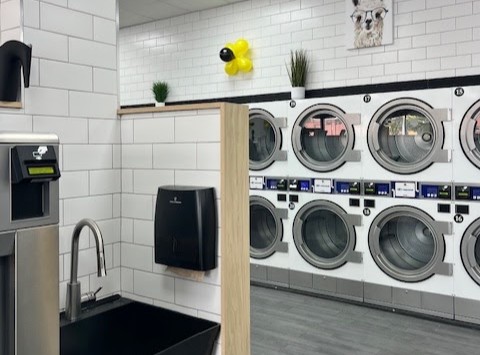 Sink station and dryers at LaundryBee Canarsie