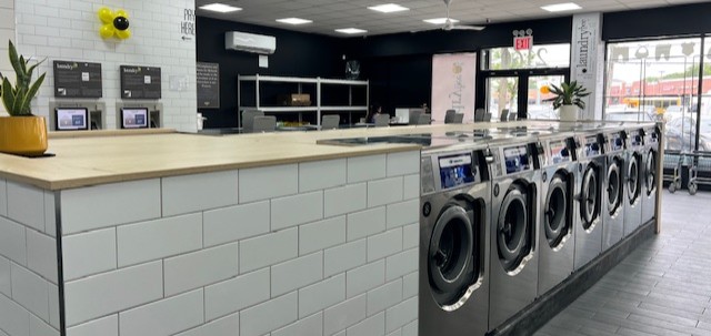 Folding counter and washers at LaundryBee Canarsie