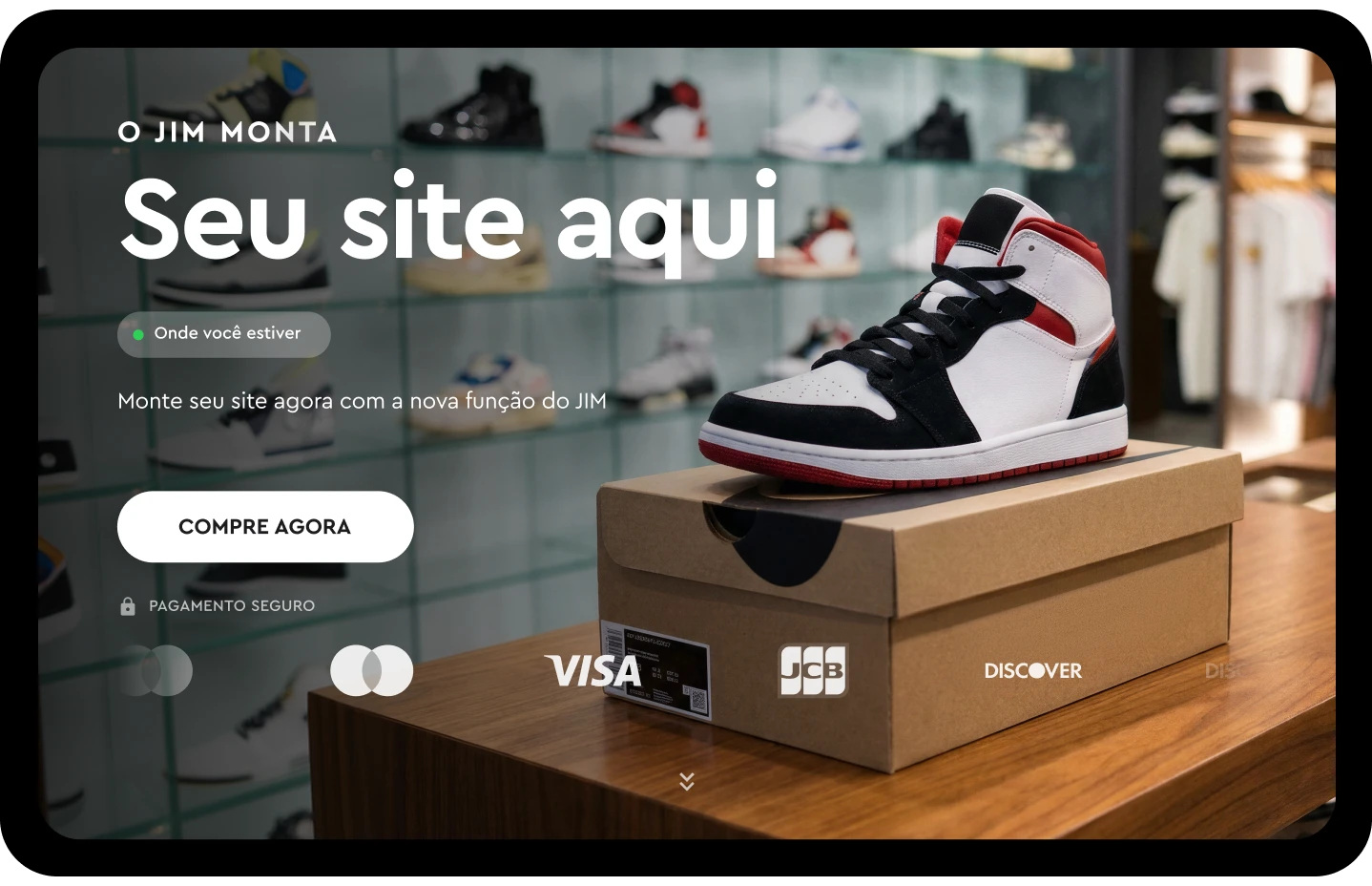 Black, white, and red sneaker on a shoe box in a store with shelves of shoes in the background.