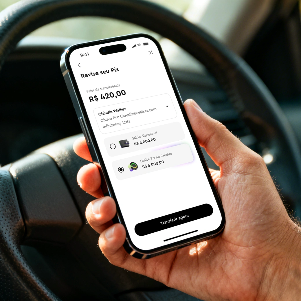 Person holding phone showing Pix transfer of R$420 to Cláudia Walker with transfer options and button.