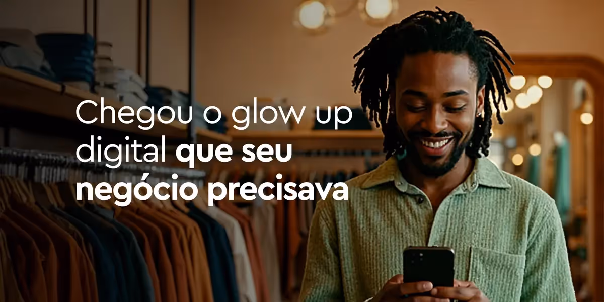 banner da campanha com um homem em um ambiente de loja olhando para celular com um lettering ao lado "chegou o upgrade digital que seu negócio precisava"