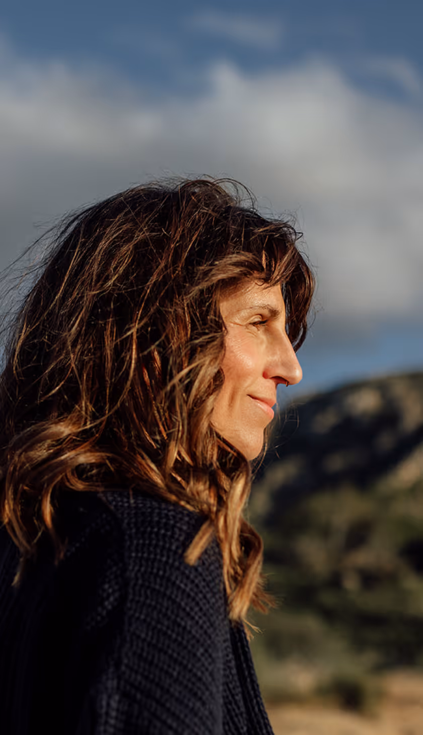 Julie Breiert, Founder of SomaSoul on a beach