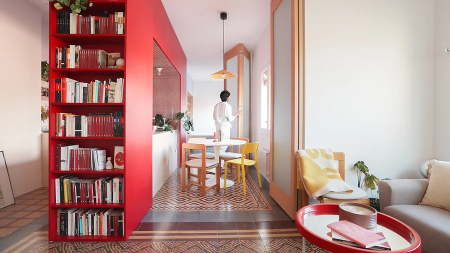 A Small Madrid Apartment That Traded Walls for Vibrant Volumes
