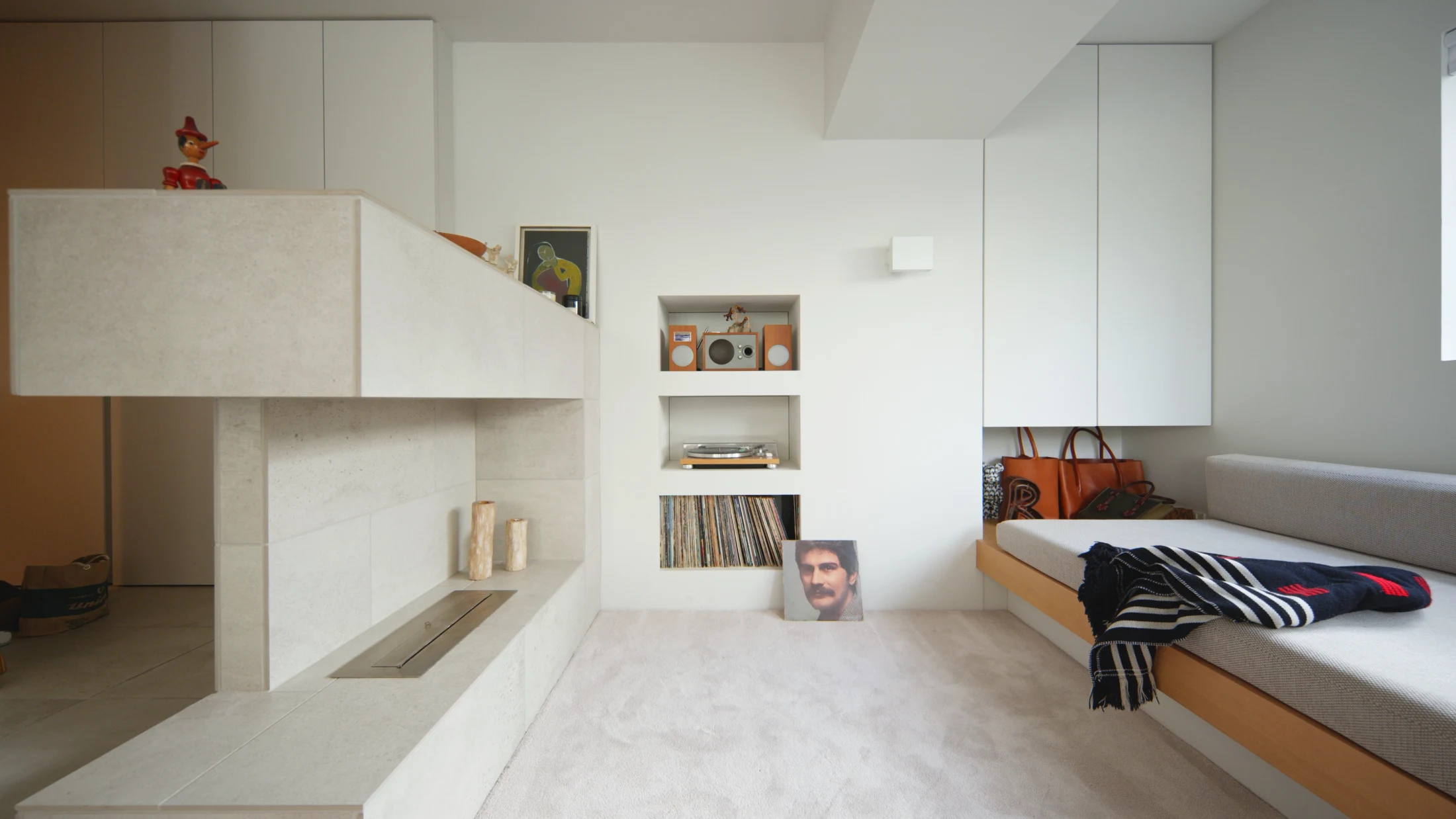 (ABOVE) In designing this home for herself and her partner and cat, architect Kumiko Ouchi of Small Design Studio, had the freedom to design clever storage nooks tailored to the dimensions of her record collection, record player, amp and speakers. She also designed a nook for her handbag collection. Image: Never Too Small.