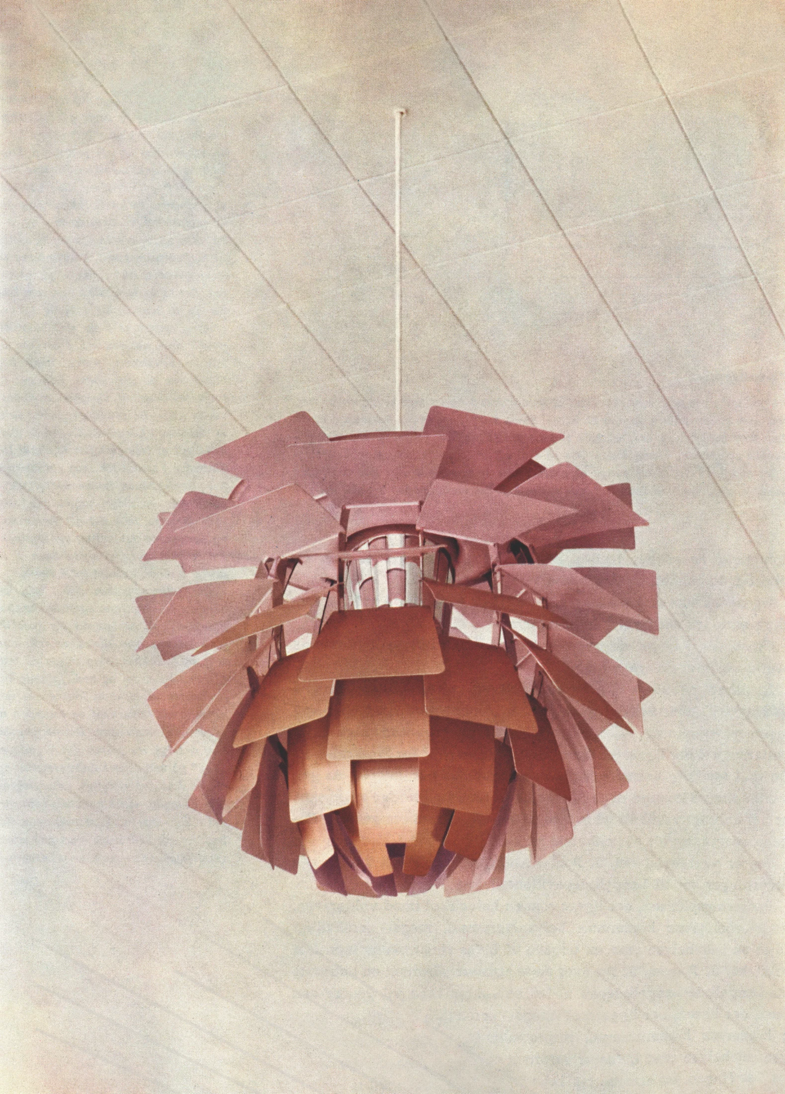 Louis Poulsen's Pale Rose collection, released in 2023, features iconic designs by Poul Henningsen and Vilhelm Lauritzen reinterpreted in pale rose opal glass with brass hardware. Image: Courtesy and copyright © Louis Poulsen.