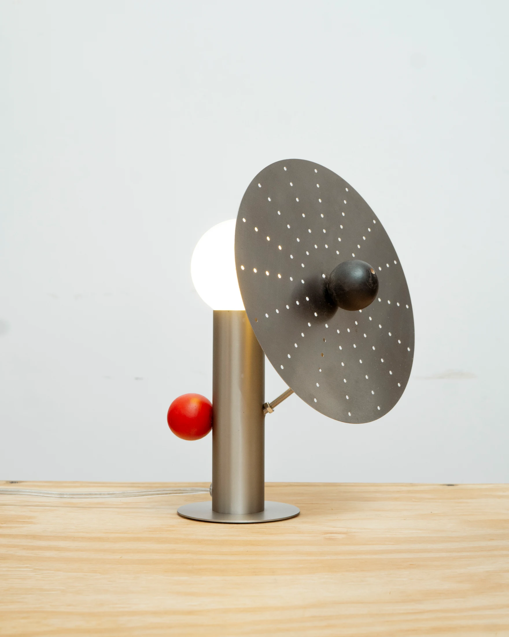 Lamp with Ballss and Steam Shade features a discarded metal insert used for steam cooking.
